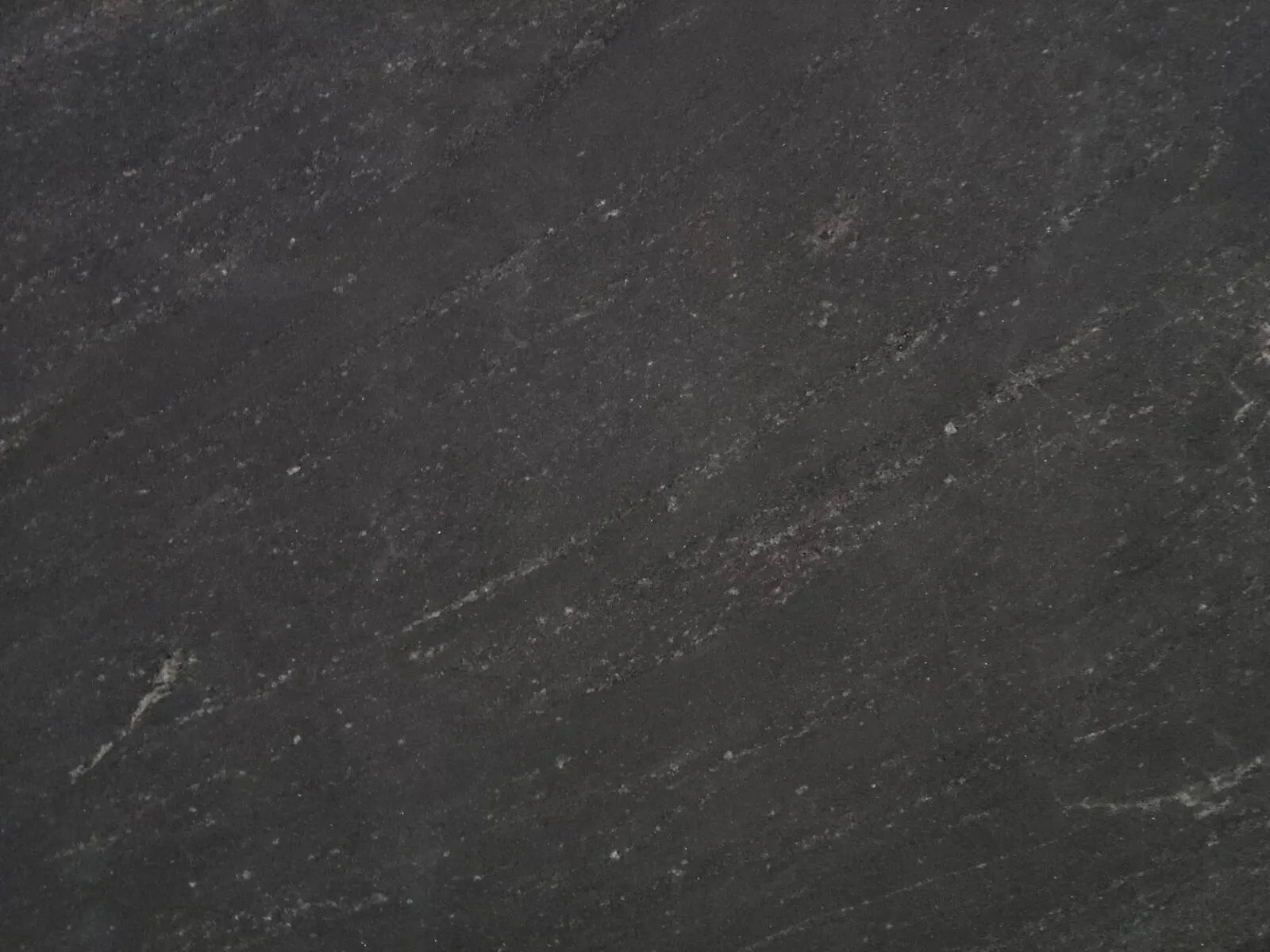 Closeup image of Black Mist Black Granite countertop slab