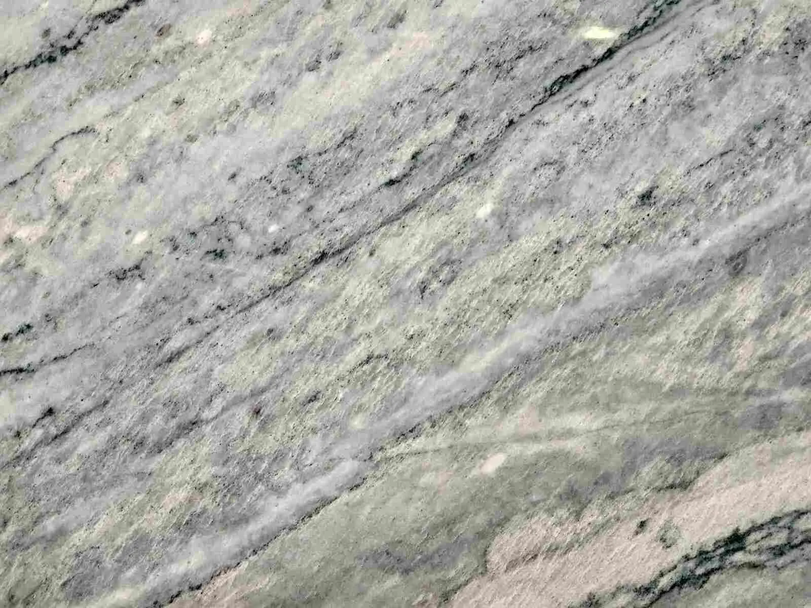 Closeup image of Blue Macaubus Green Quartzite countertop slab