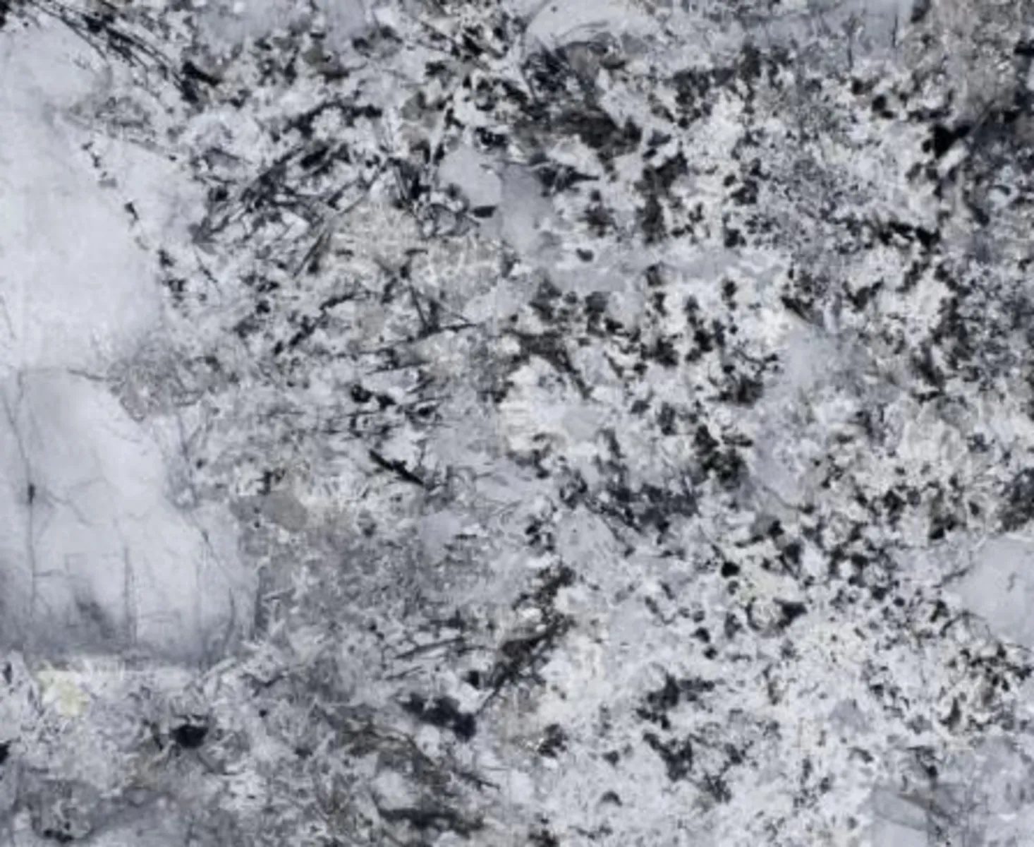 Closeup image of Branco Glacier Grey Granite countertop slab