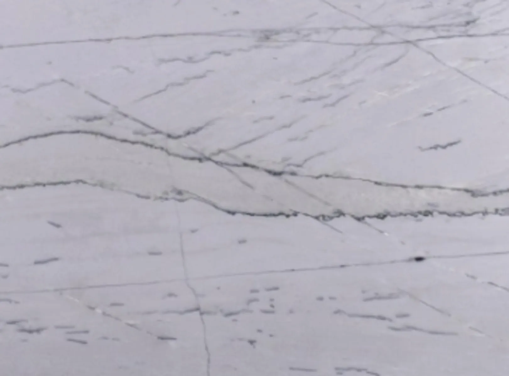 Closeup image of Calacatta Grey Quartzite countertop slab