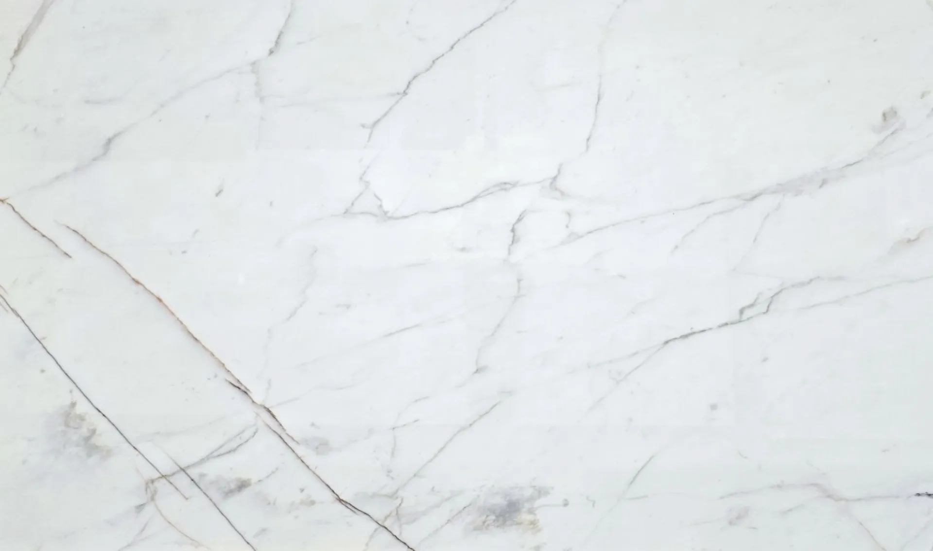 Closeup image of Calacatta Gold Lux White Marble countertop slab