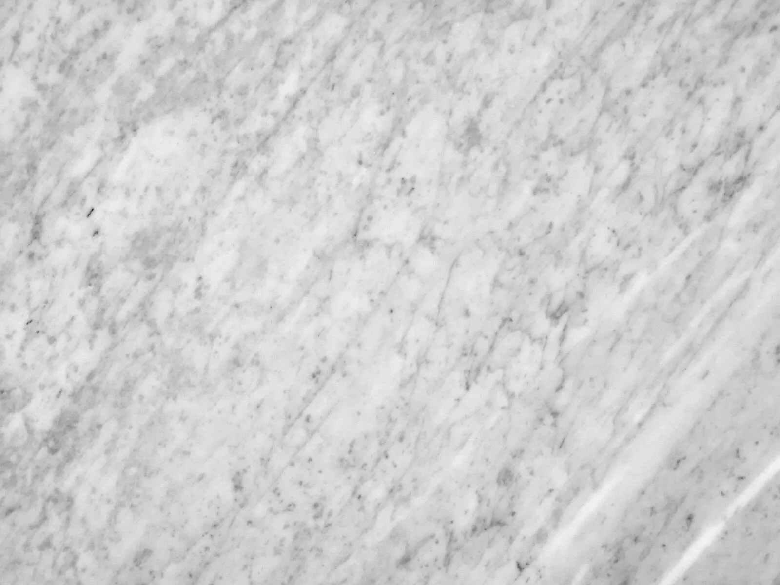 Closeup image of Carrara White Extra White Marble countertop slab