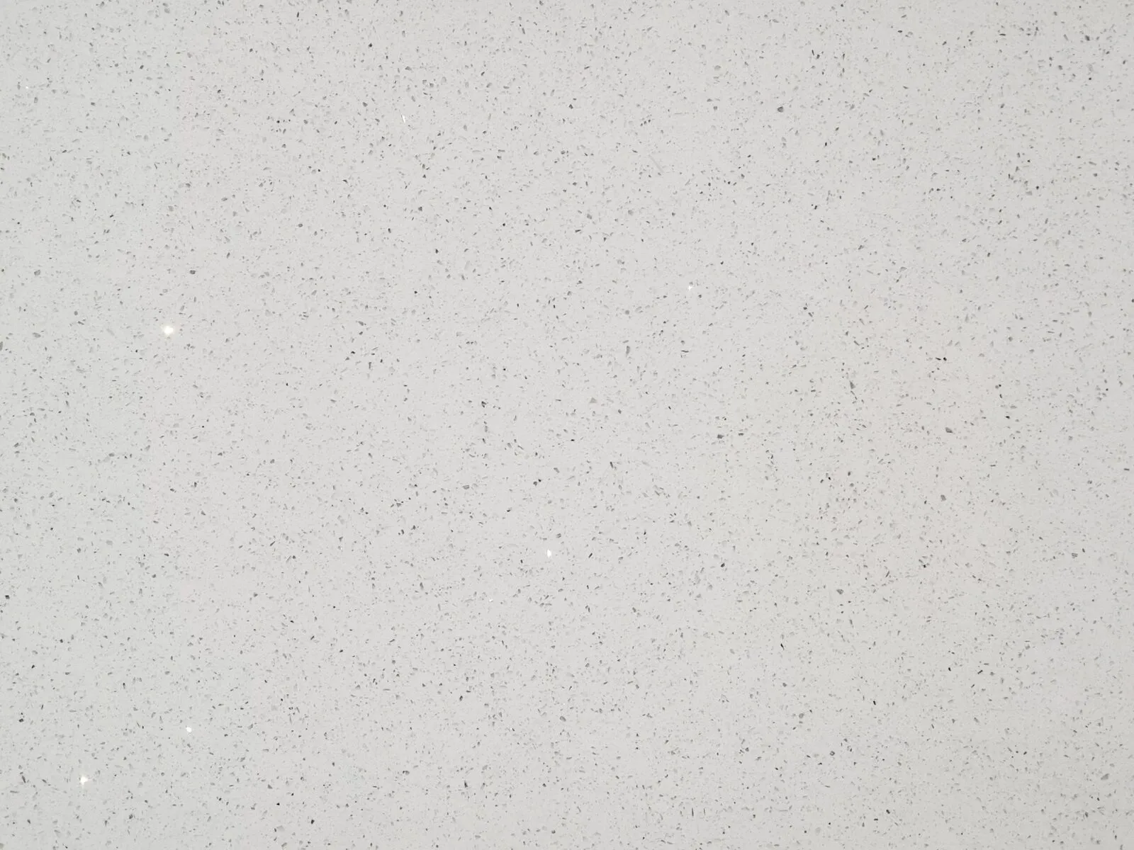 Closeup image of CRS Quartz Star White White Quartz countertop slab