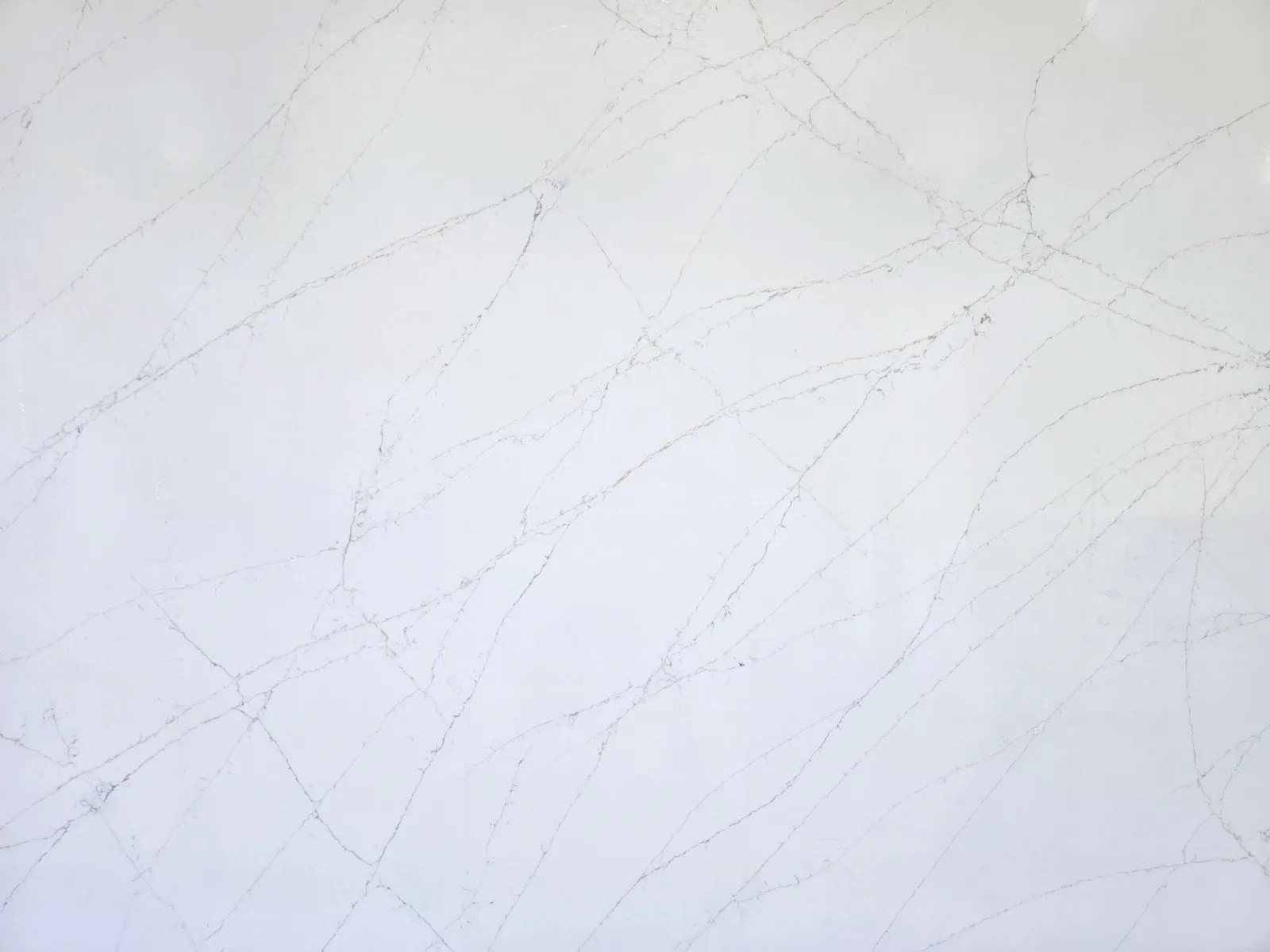 Closeup image of CRS Quartz Arena Super Jumbo White Quartz countertop slab