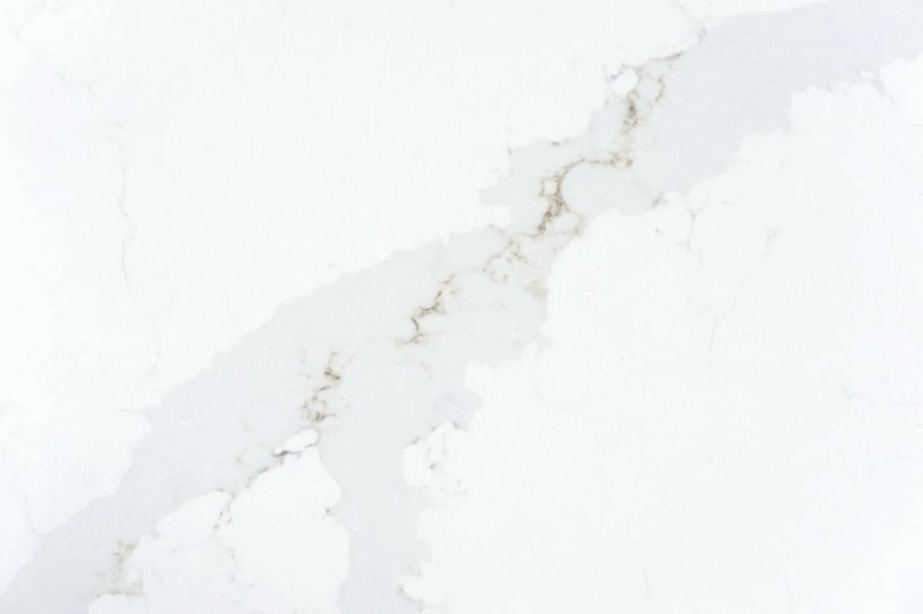 Closeup image of CRS Quartz Calacatta Eternal Gold Super Jumbo White Quartz countertop slab