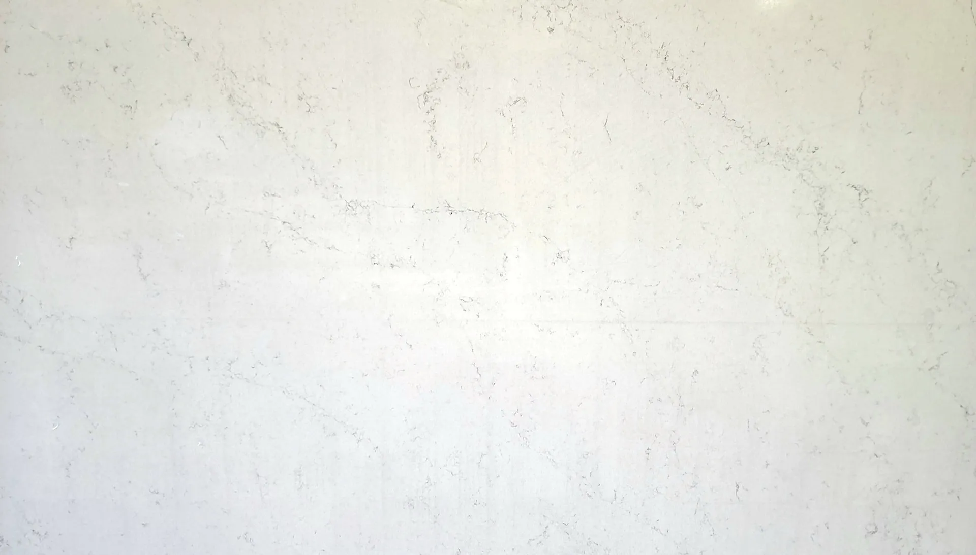 Closeup image of CRS Quartz Calacatta Viola Super Jumbo Cream Quartz countertop slab