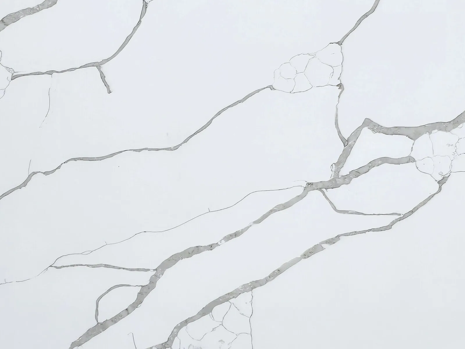 Closeup image of CRS Quartz Calacatta Lazza White Quartz countertop slab