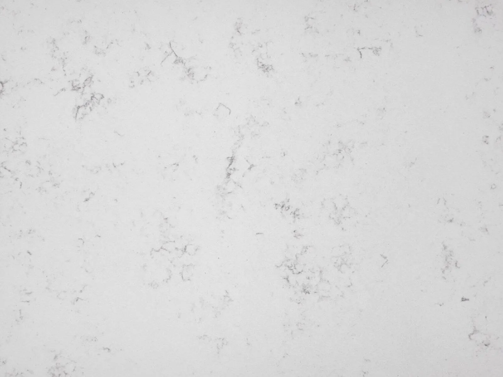 Closeup image of CRS Quartz Carrara White Extra White Quartz countertop slab