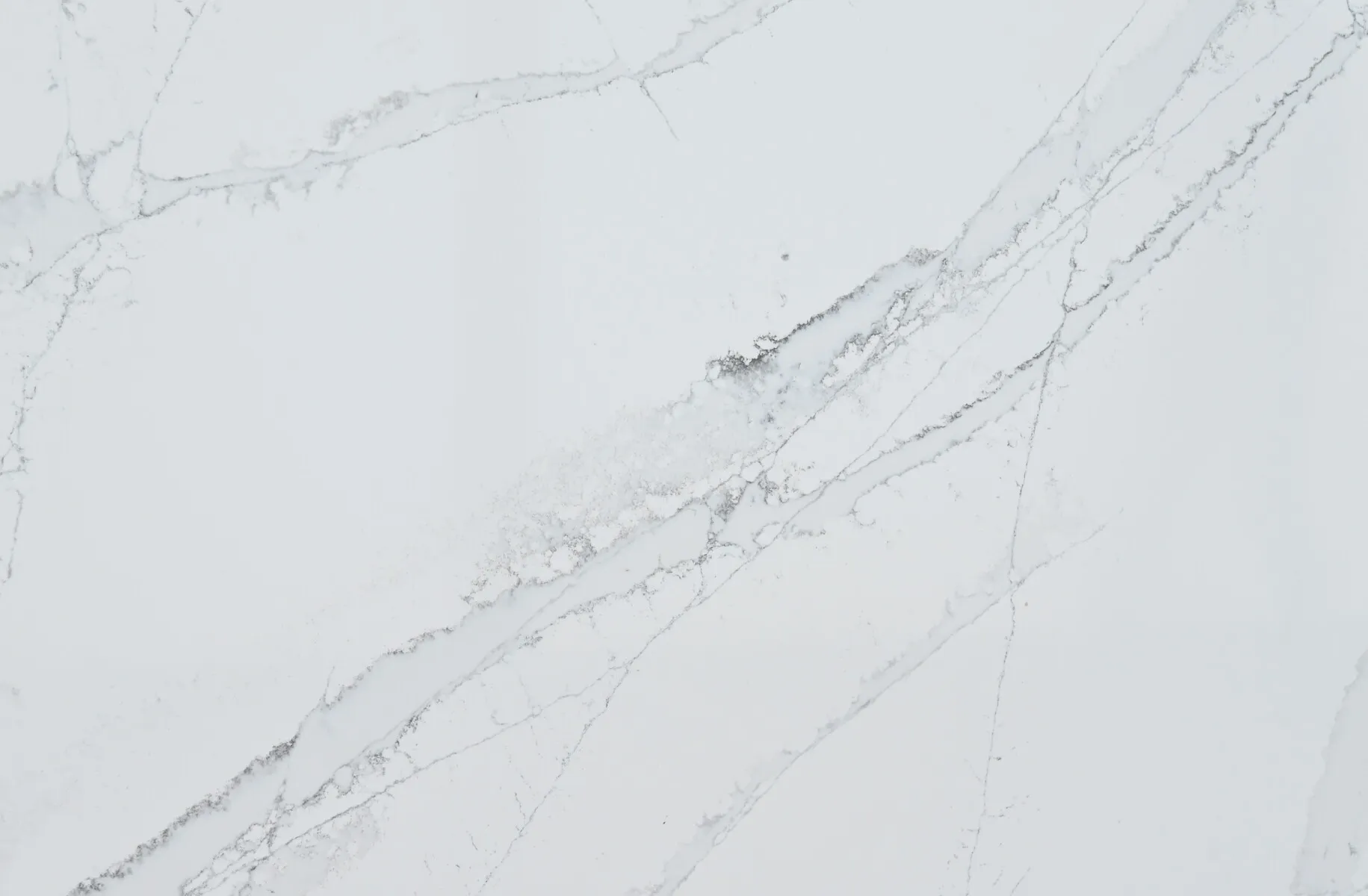 Closeup image of CRS Quartz Elvis Super Jumbo White Quartz countertop slab