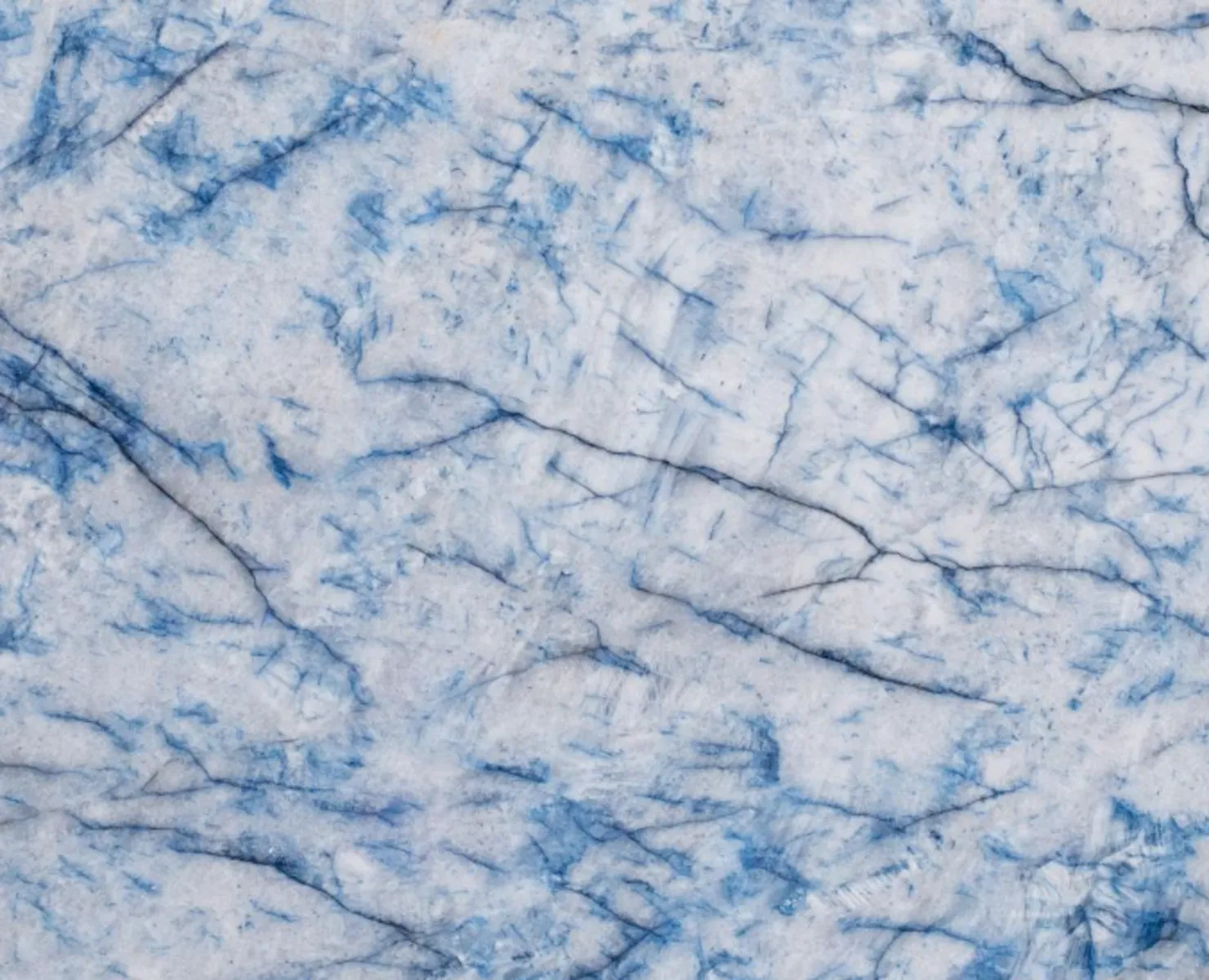 Closeup image of Diamante Azul Cristallo White Quartzite countertop slab