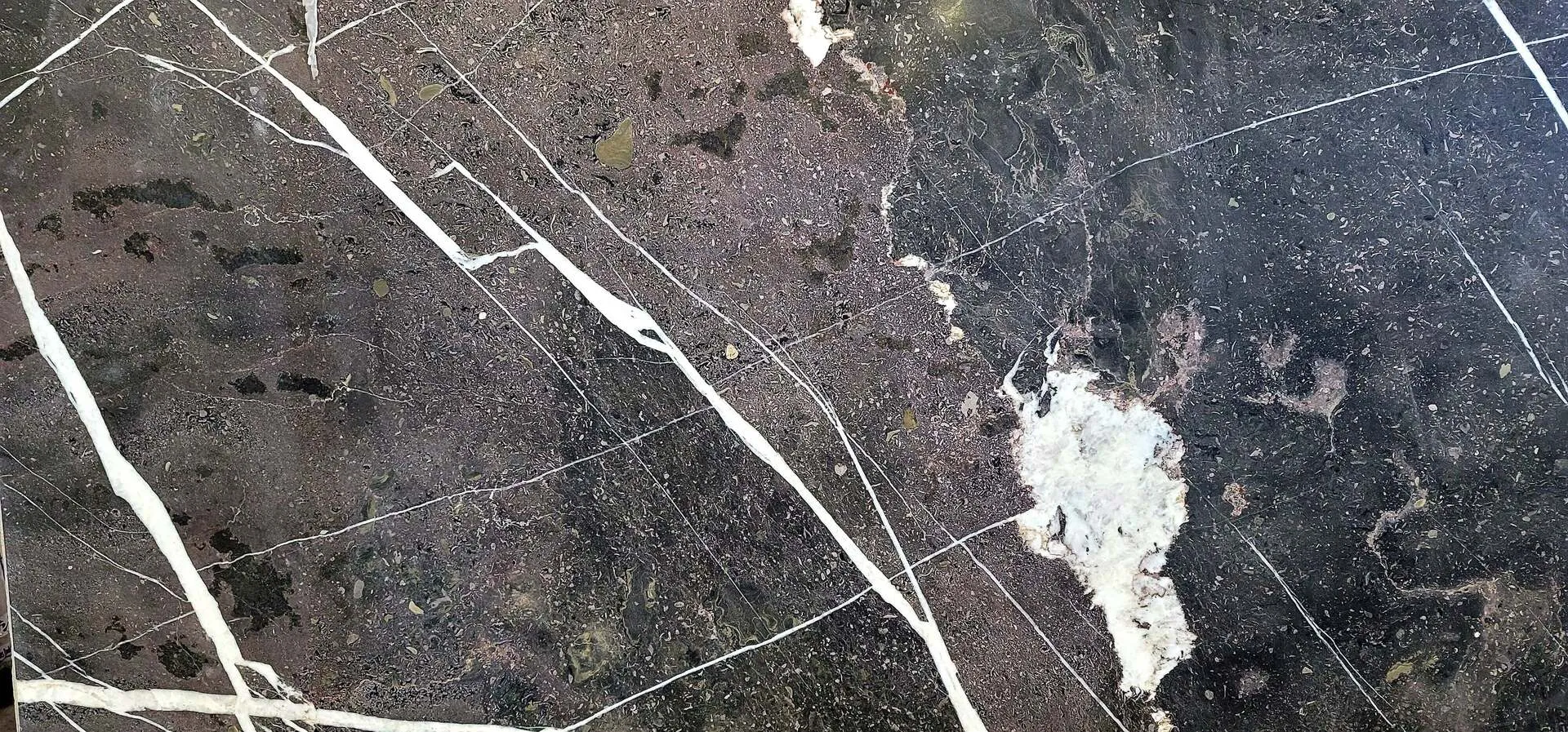 Closeup image of Enigma Black Soapstone countertop slab