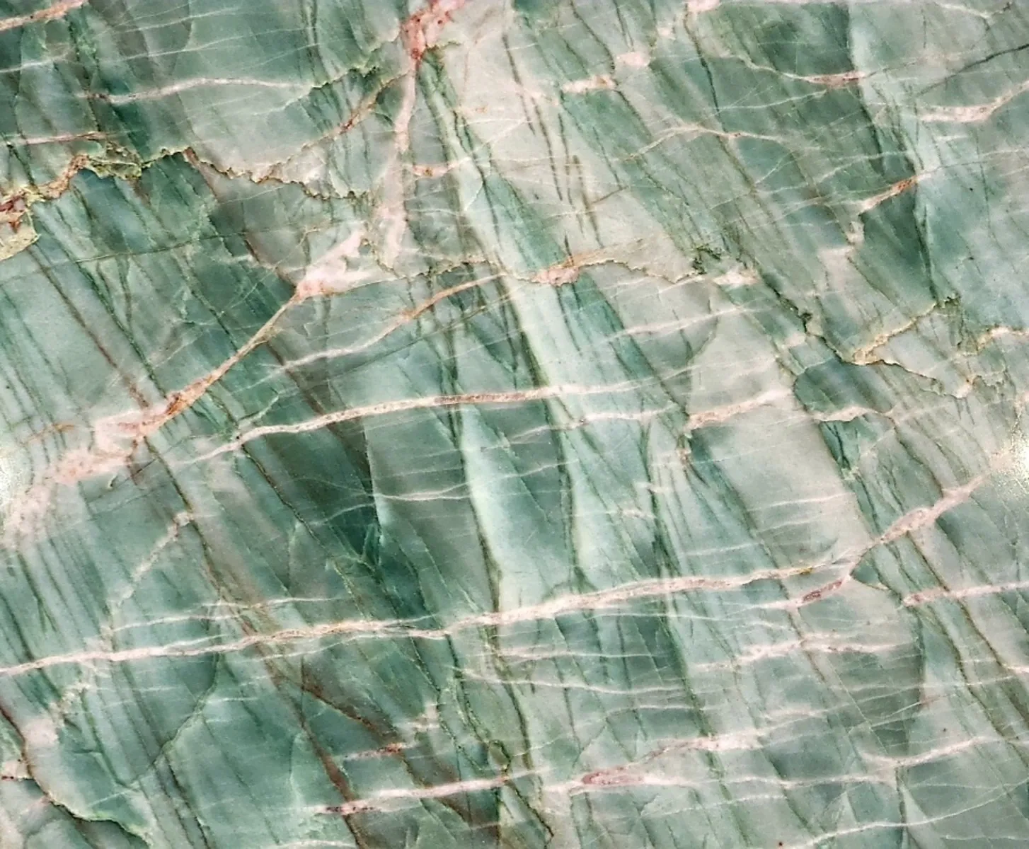Closeup image of Esmerald Lake Green Quartzite countertop slab