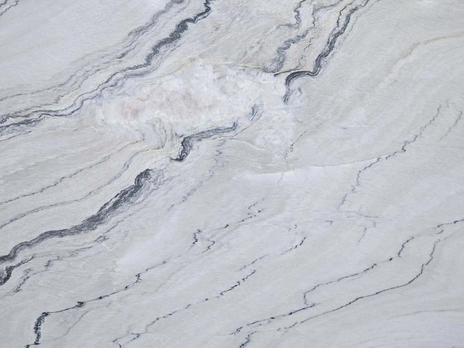 Closeup image of Fantasy Macaubus Grey Quartzite countertop slab