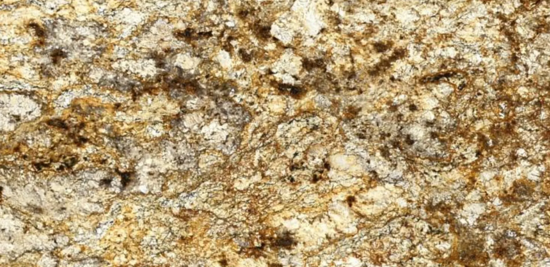 Closeup image of Golden Crystal Gold Granite countertop slab
