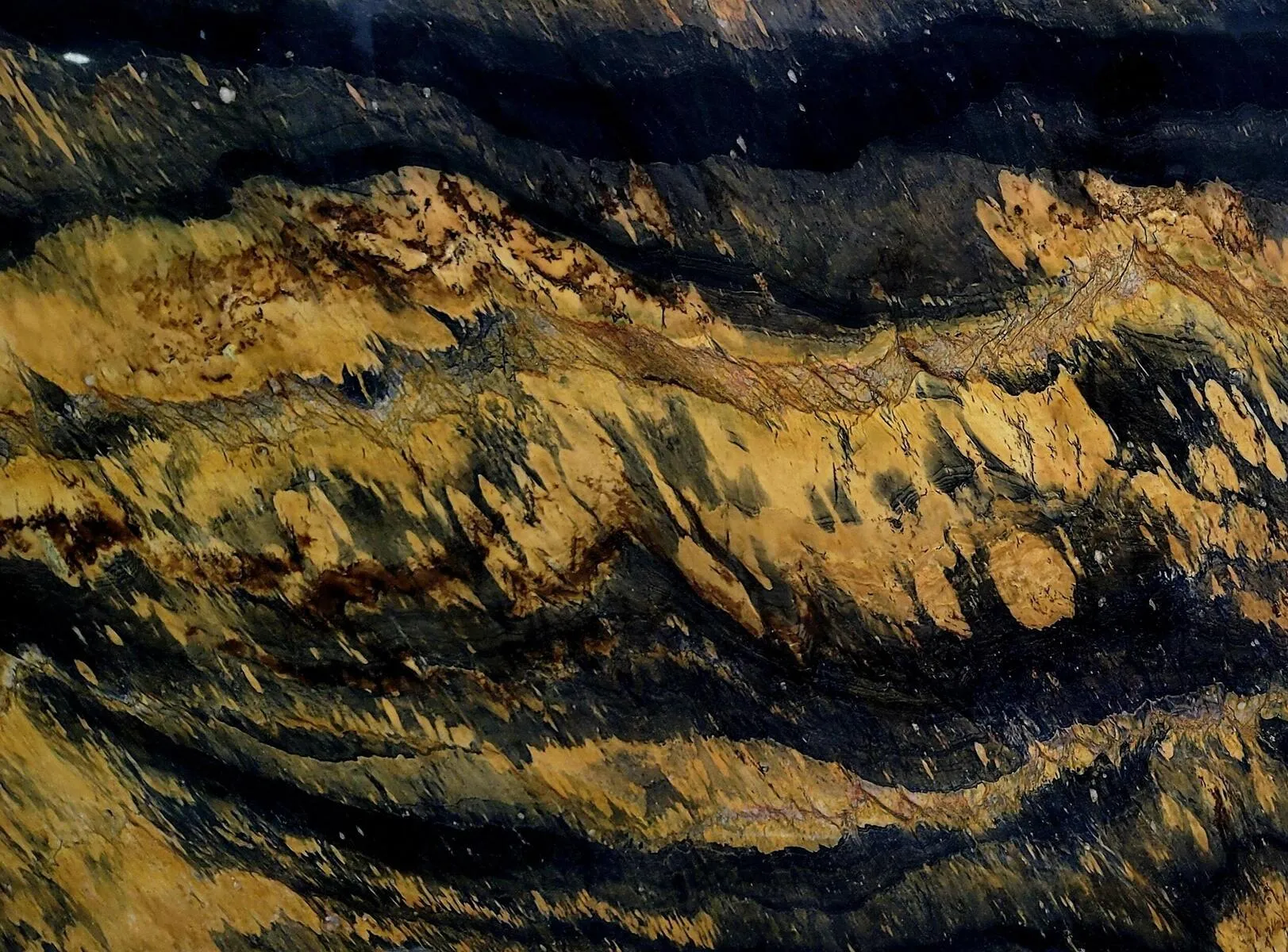 Closeup image of Jacaranda Black Quartzite countertop slab