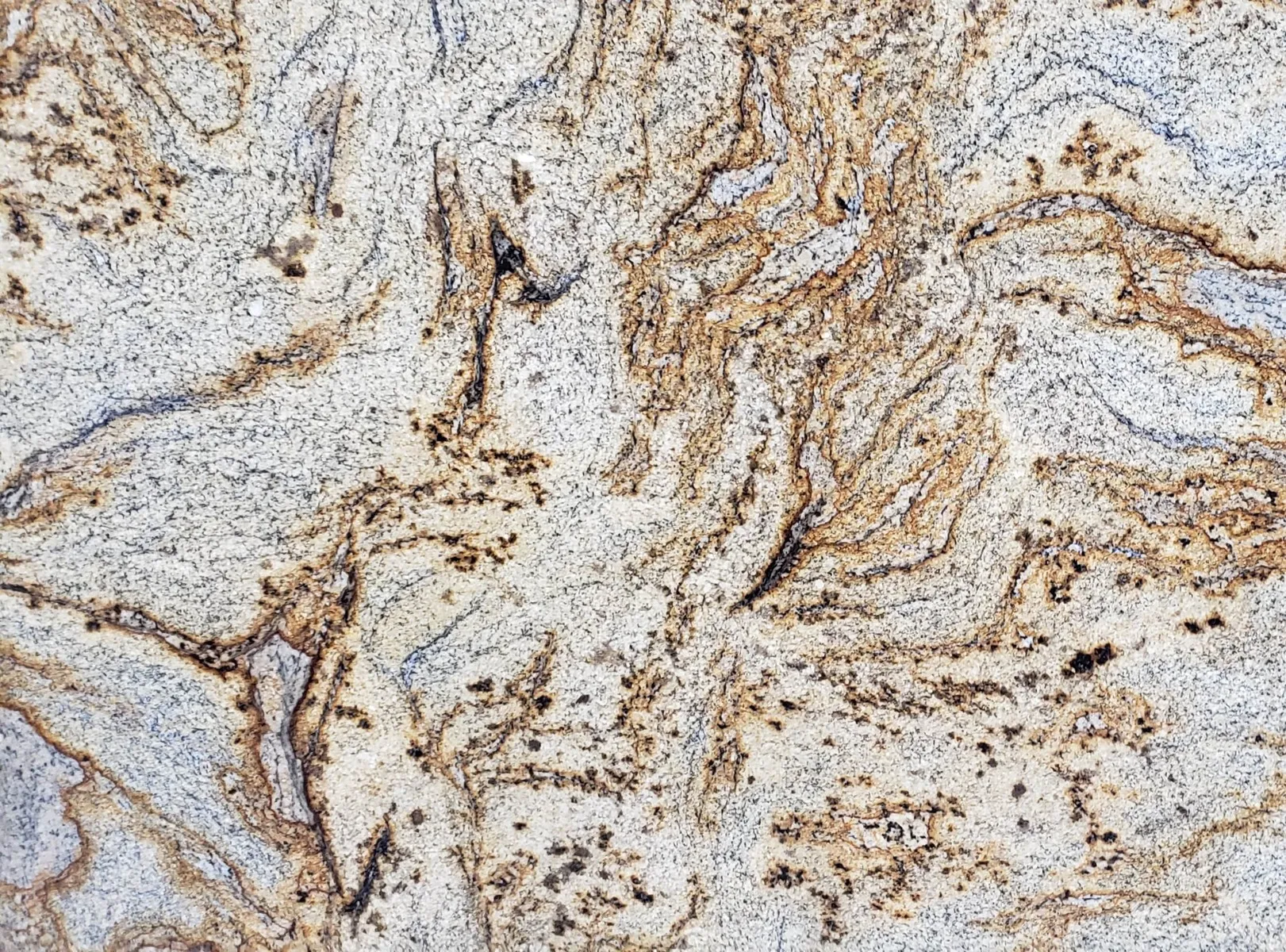 Closeup image of Jaguar Beige Granite countertop slab