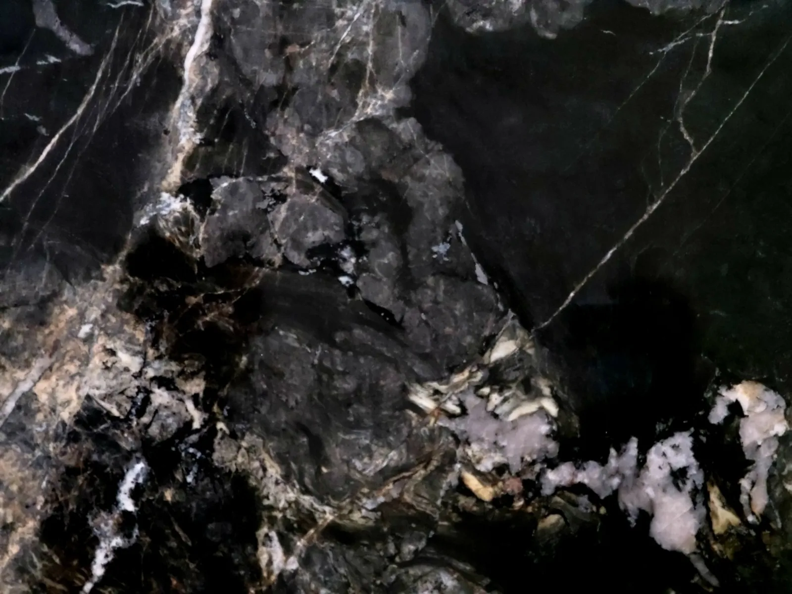 Closeup image of Lava Oro Black Granite countertop slab
