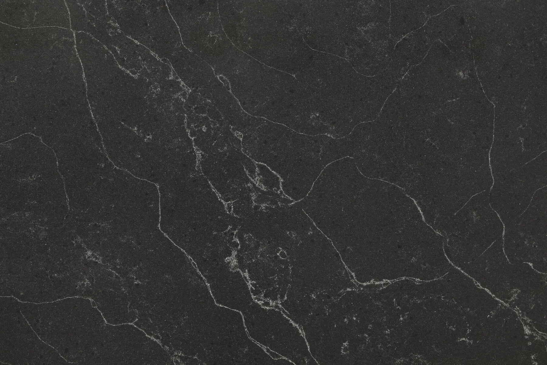 Closeup image of Viatera Carbo Brushed Black Quartz countertop slab