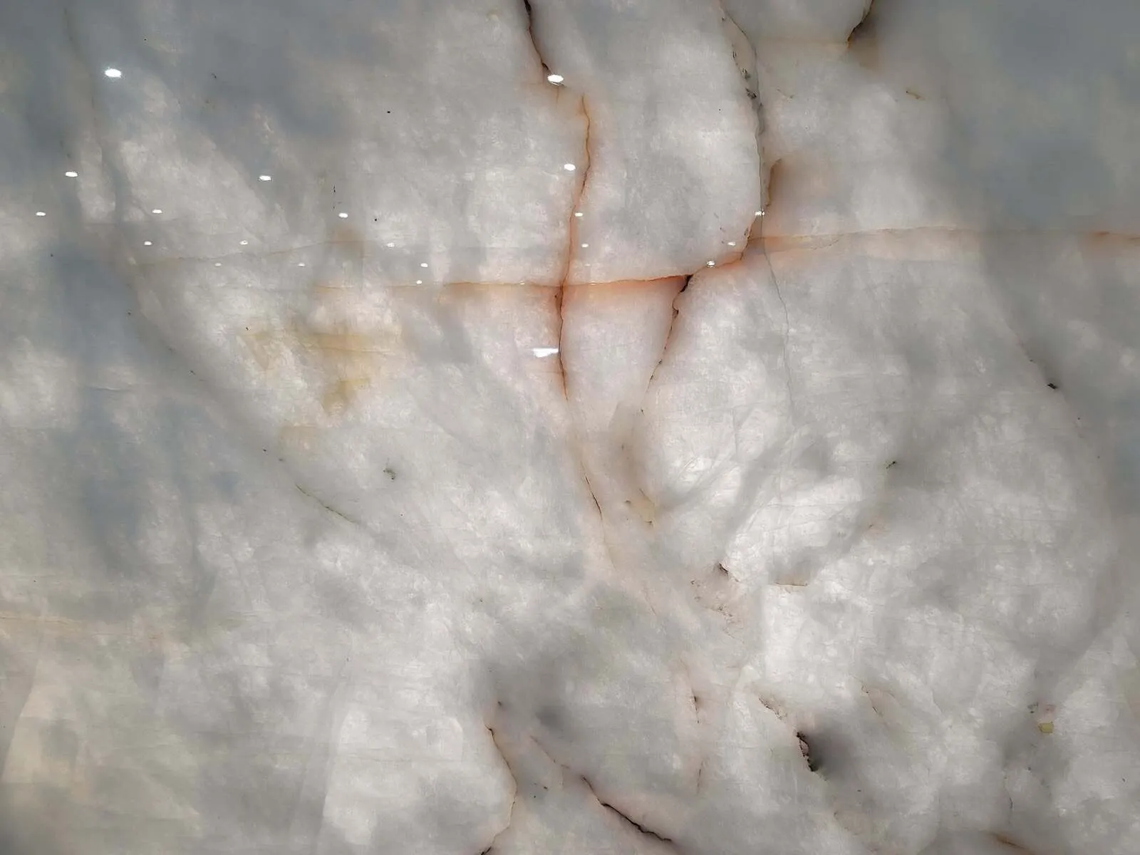Closeup image of Lucent White Quartzite countertop slab