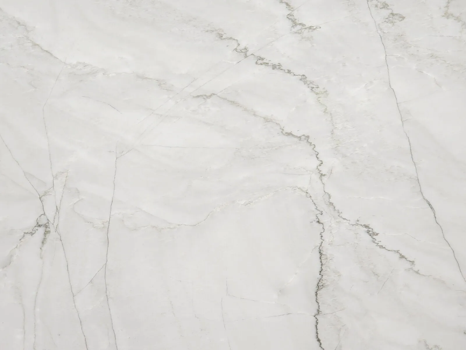 Closeup image of Muscovita White Quartzite countertop slab