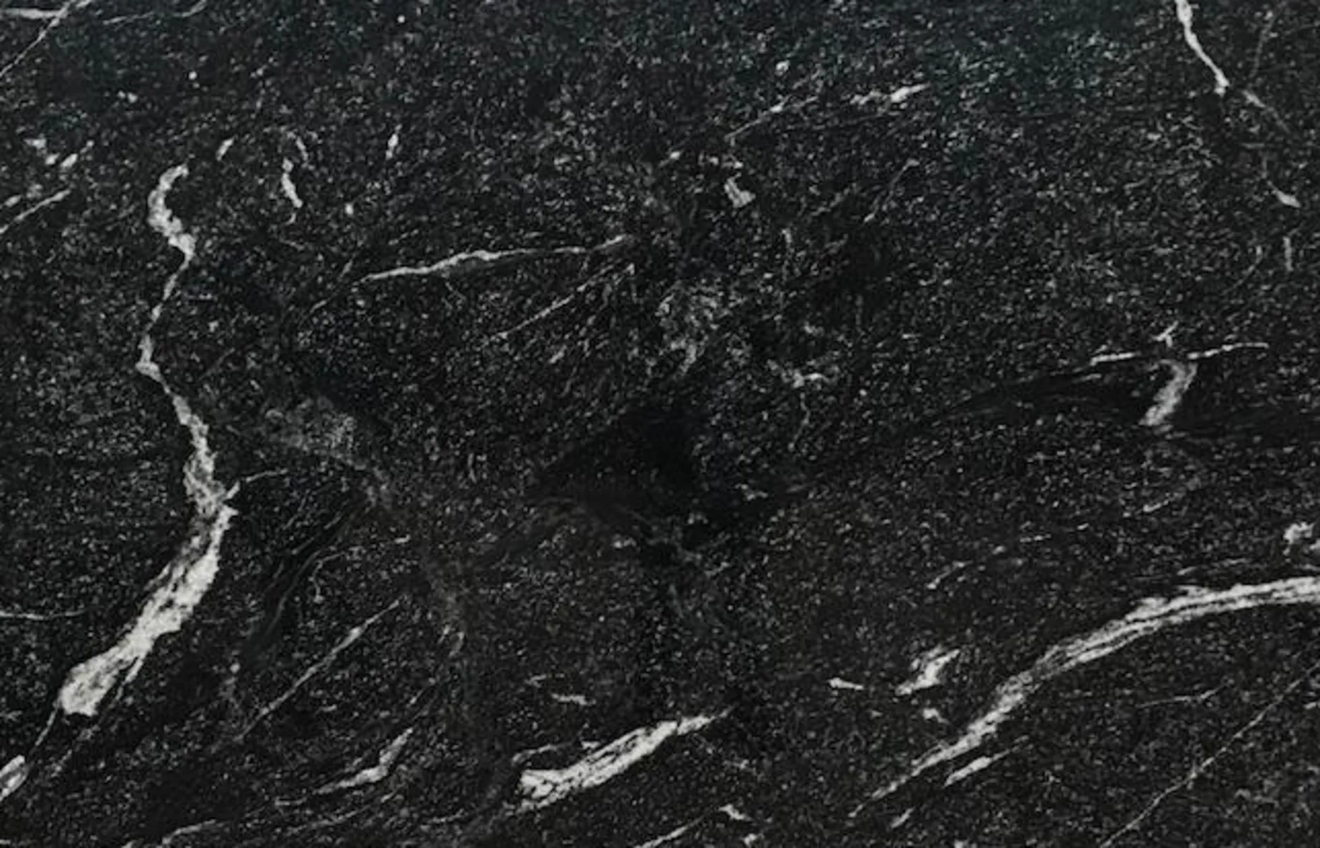 Closeup image of Mystic Black Black Granite countertop slab