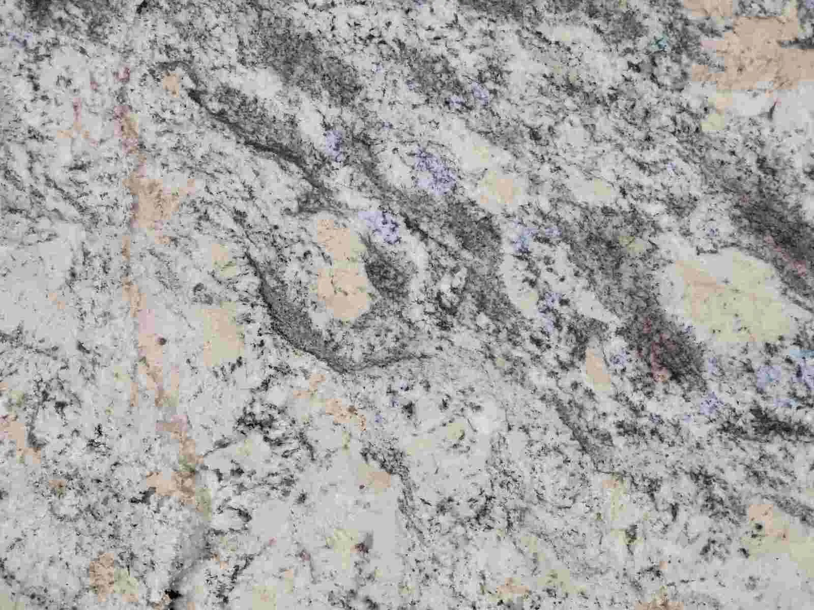 Closeup image of Netuno Bordeaux Grey Granite countertop slab