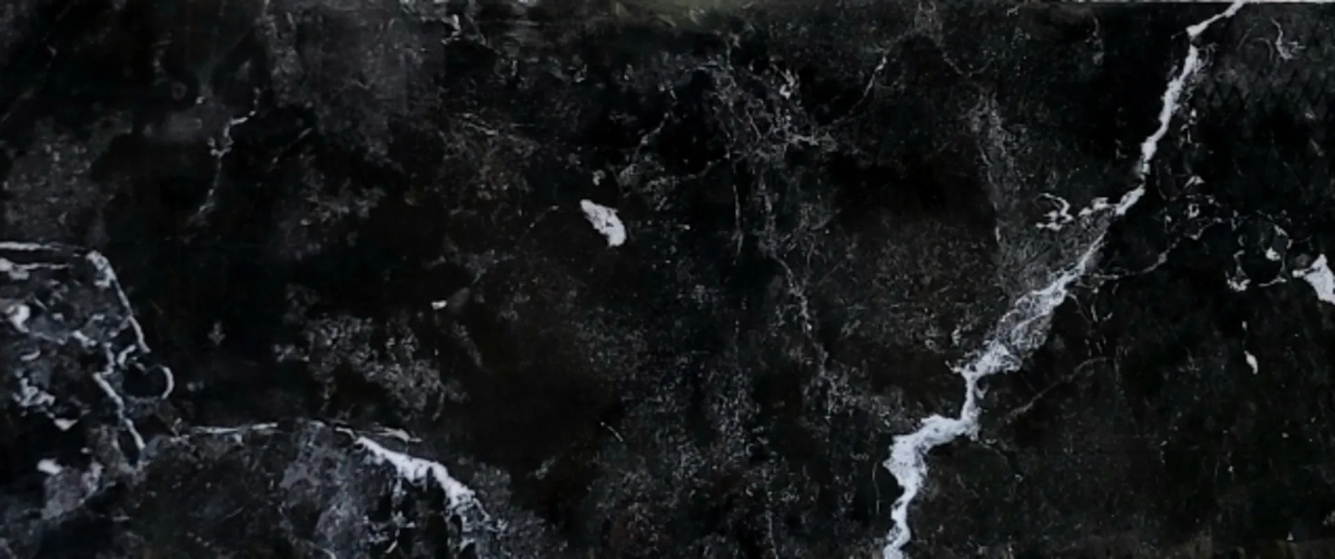 Closeup image of Ocean Black Black Soapstone countertop slab