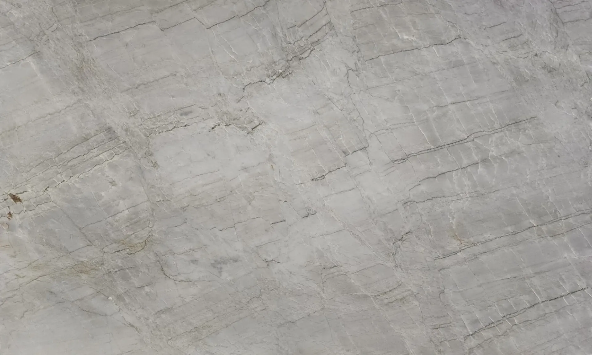 Closeup image of Perla Vento Grey Quartzite countertop slab