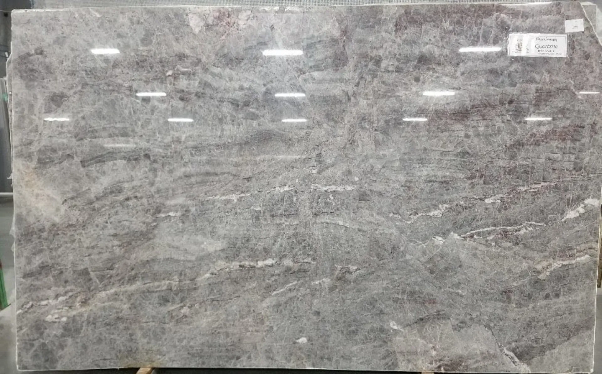 Closeup image of Platinum Grey Quartzite countertop slab