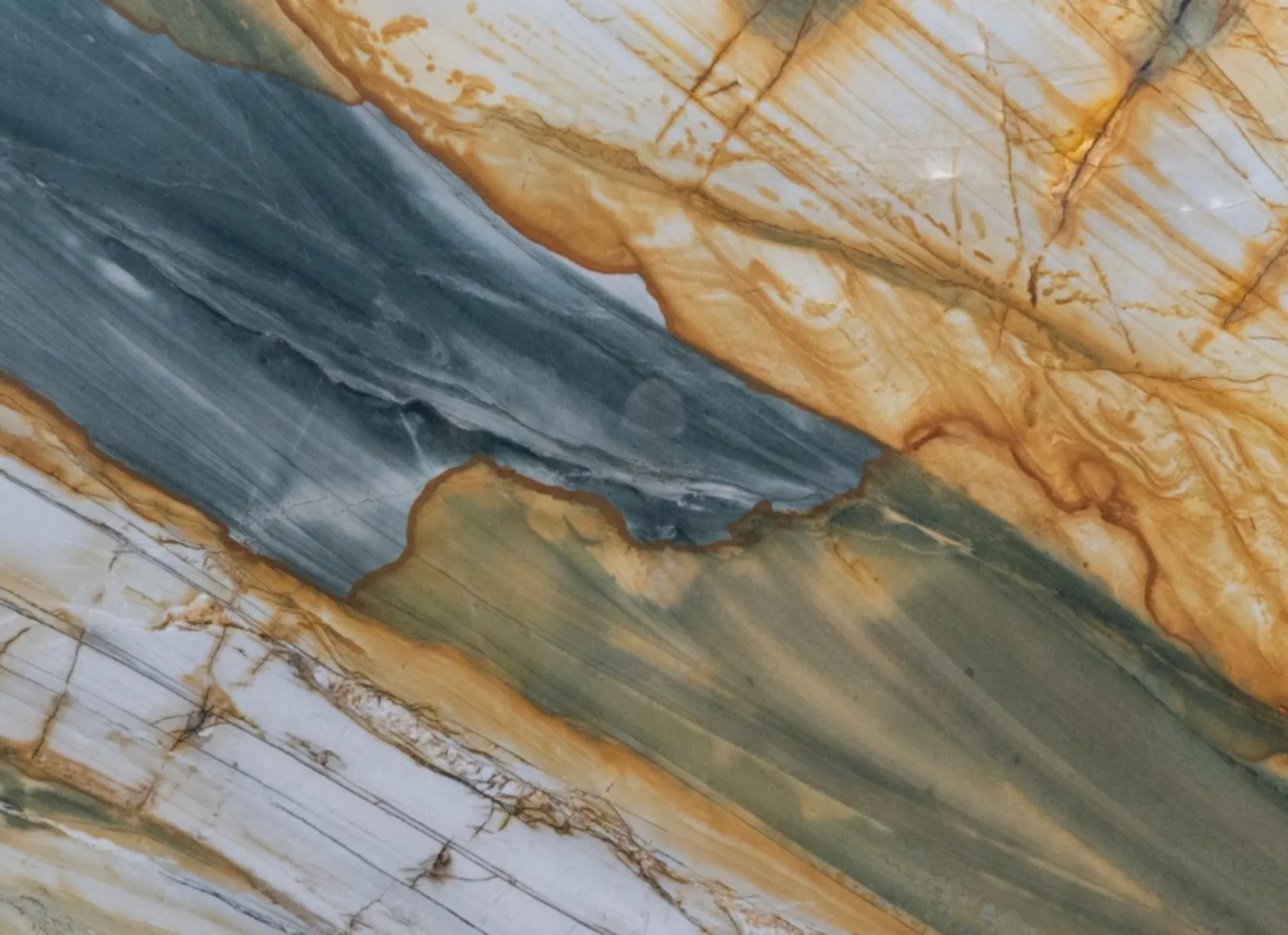 Closeup image of Polaris Gold Blue Quartzite countertop slab