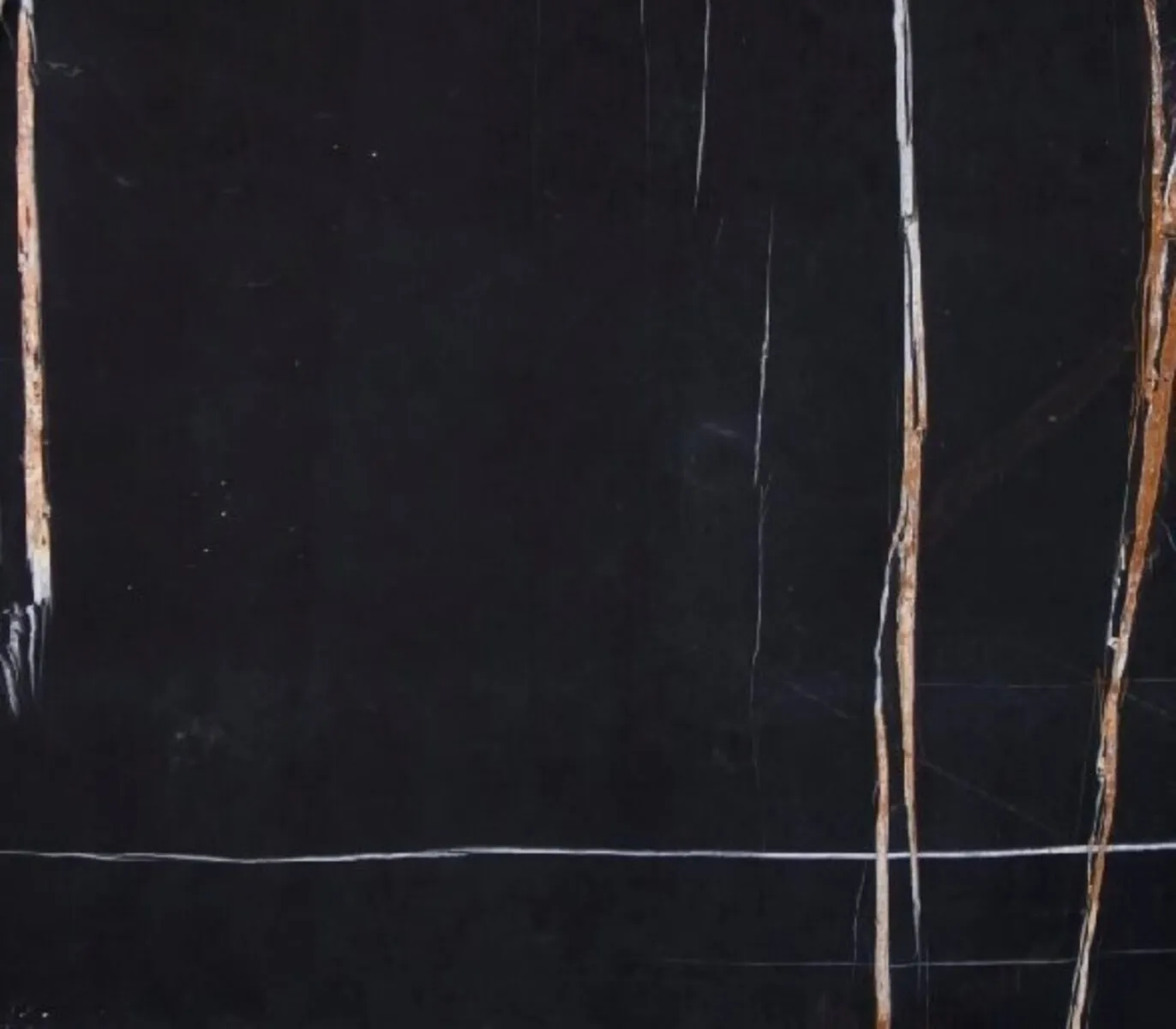 Closeup image of Sahara Noir Lux Black Marble countertop slab