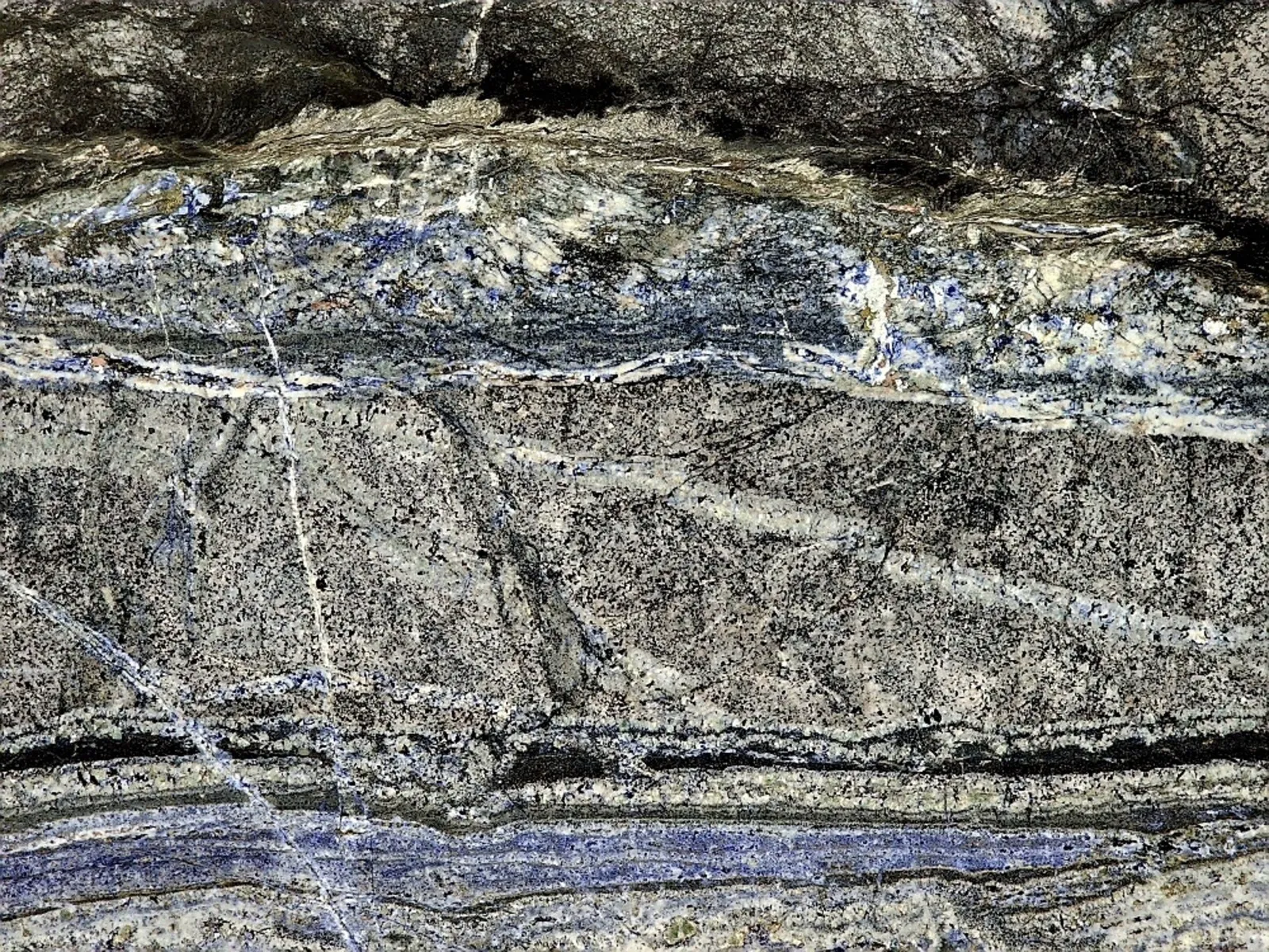 Closeup image of Sodalita Nera Grey Quartzite countertop slab