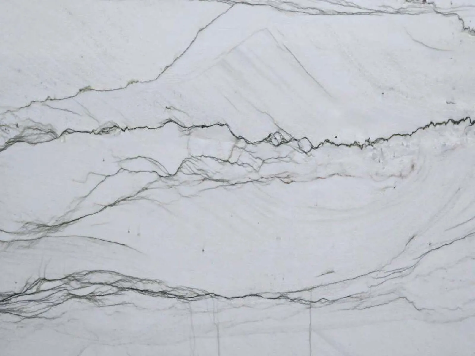 Closeup image of Statuario Extra White Quartzite countertop slab