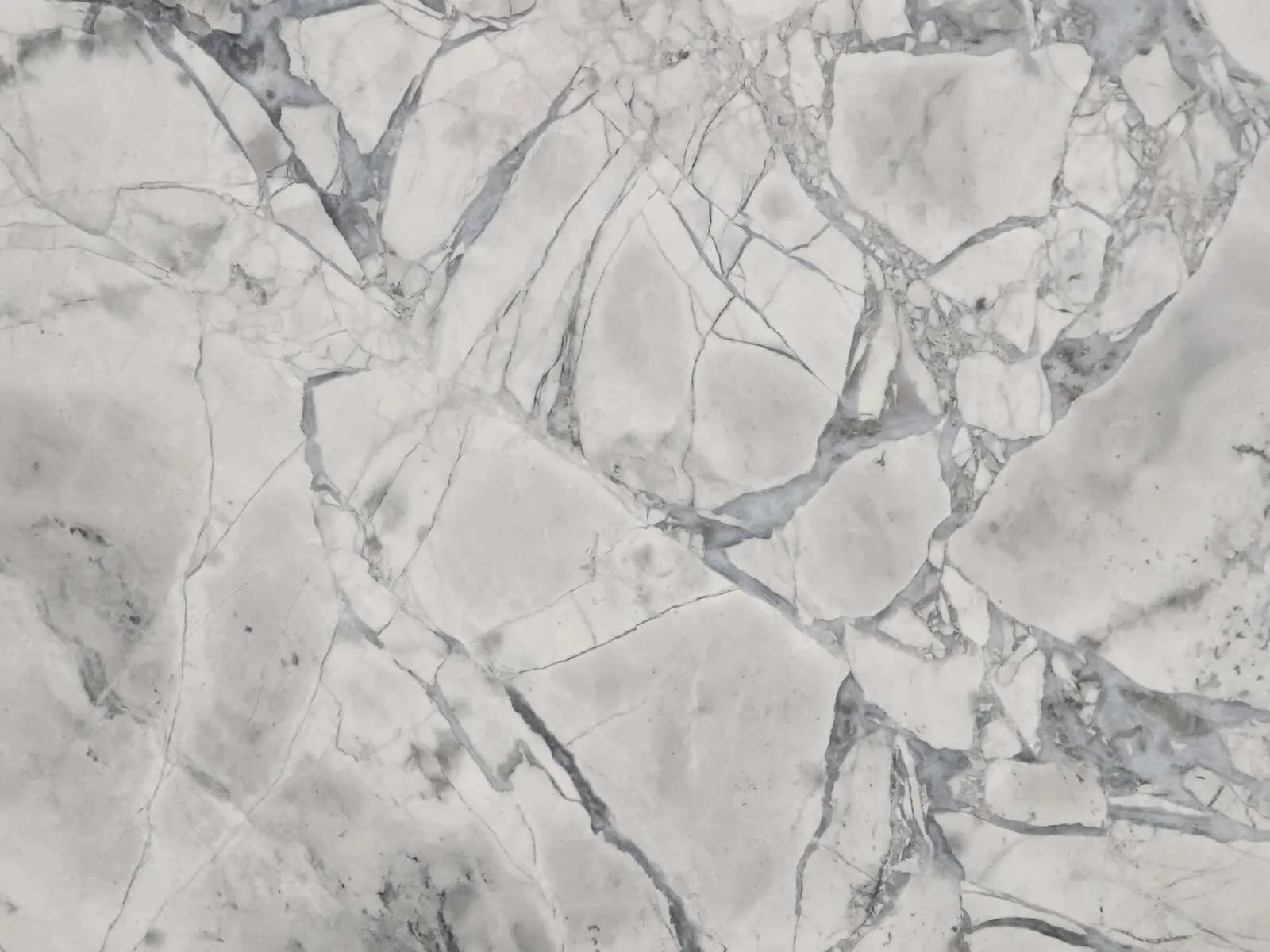 Closeup image of Super White Extra White Soapstone countertop slab