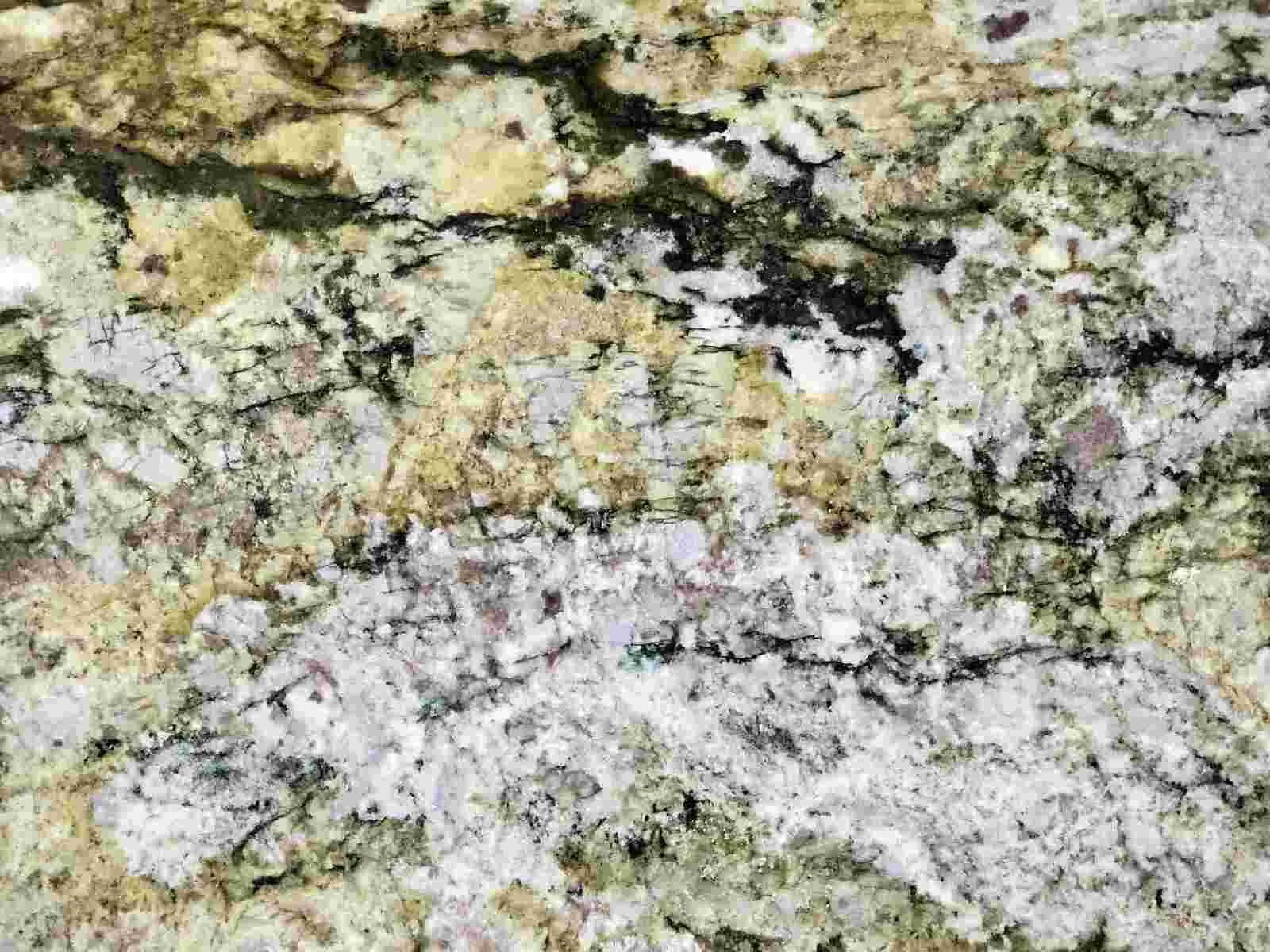 Closeup image of Timbalda Green Granite countertop slab