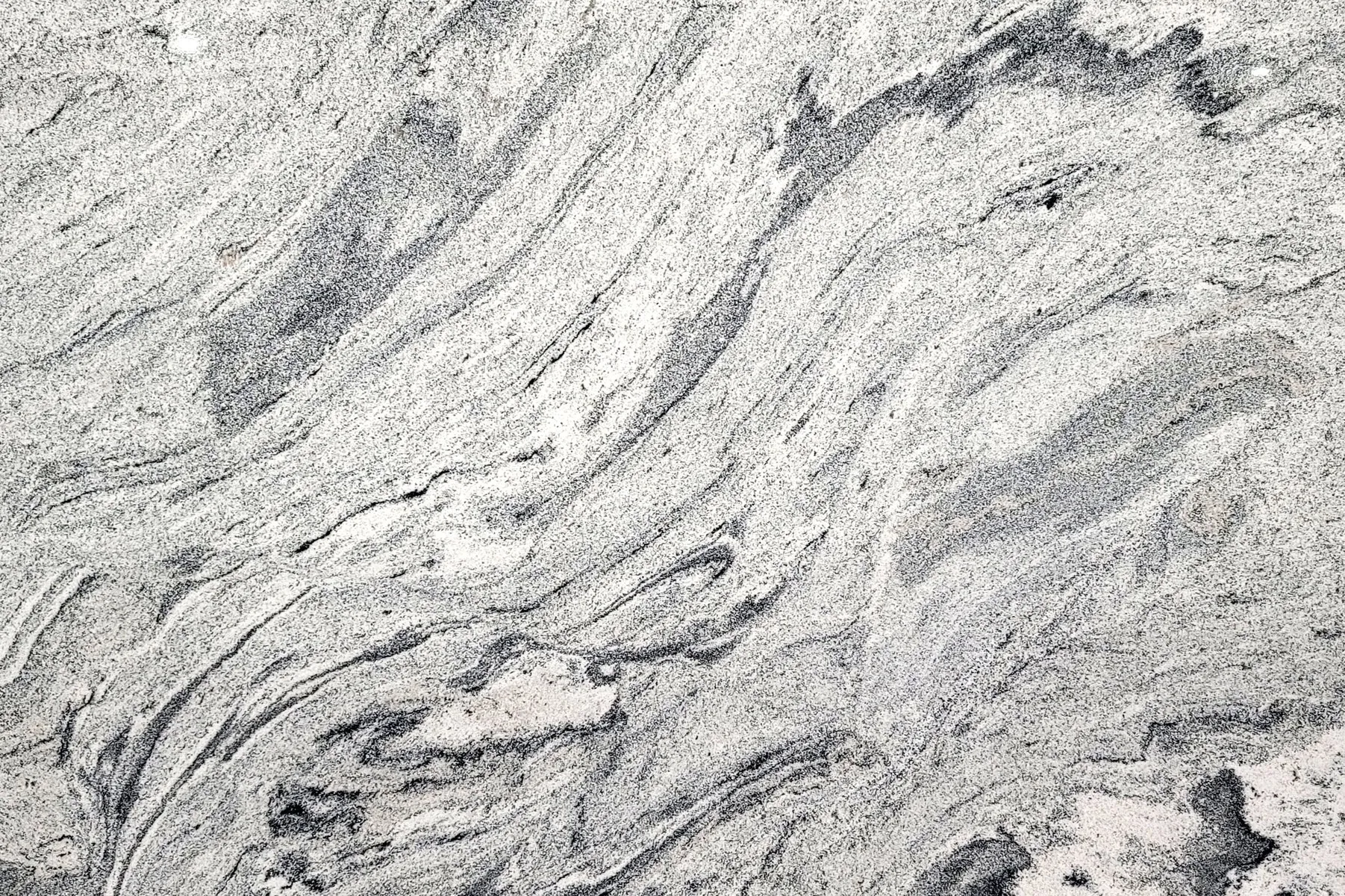 Closeup image of Viscount White Grey Granite countertop slab