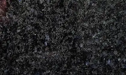 Closeup image of Volga Blue Black Granite countertop slab