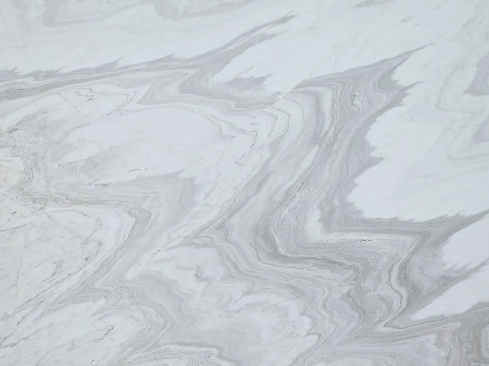 Closeup image of White Diamond Grey Marble countertop slab
