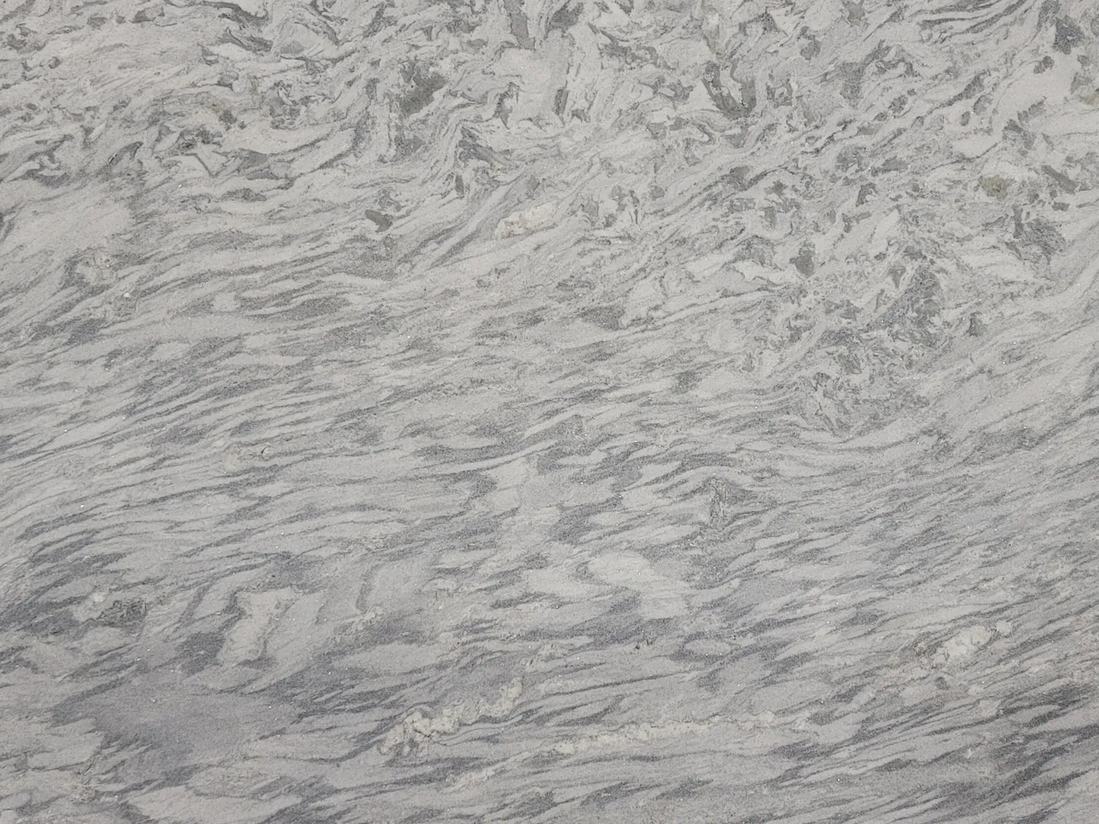 Closeup image of White Matrix Grey Soapstone countertop slab