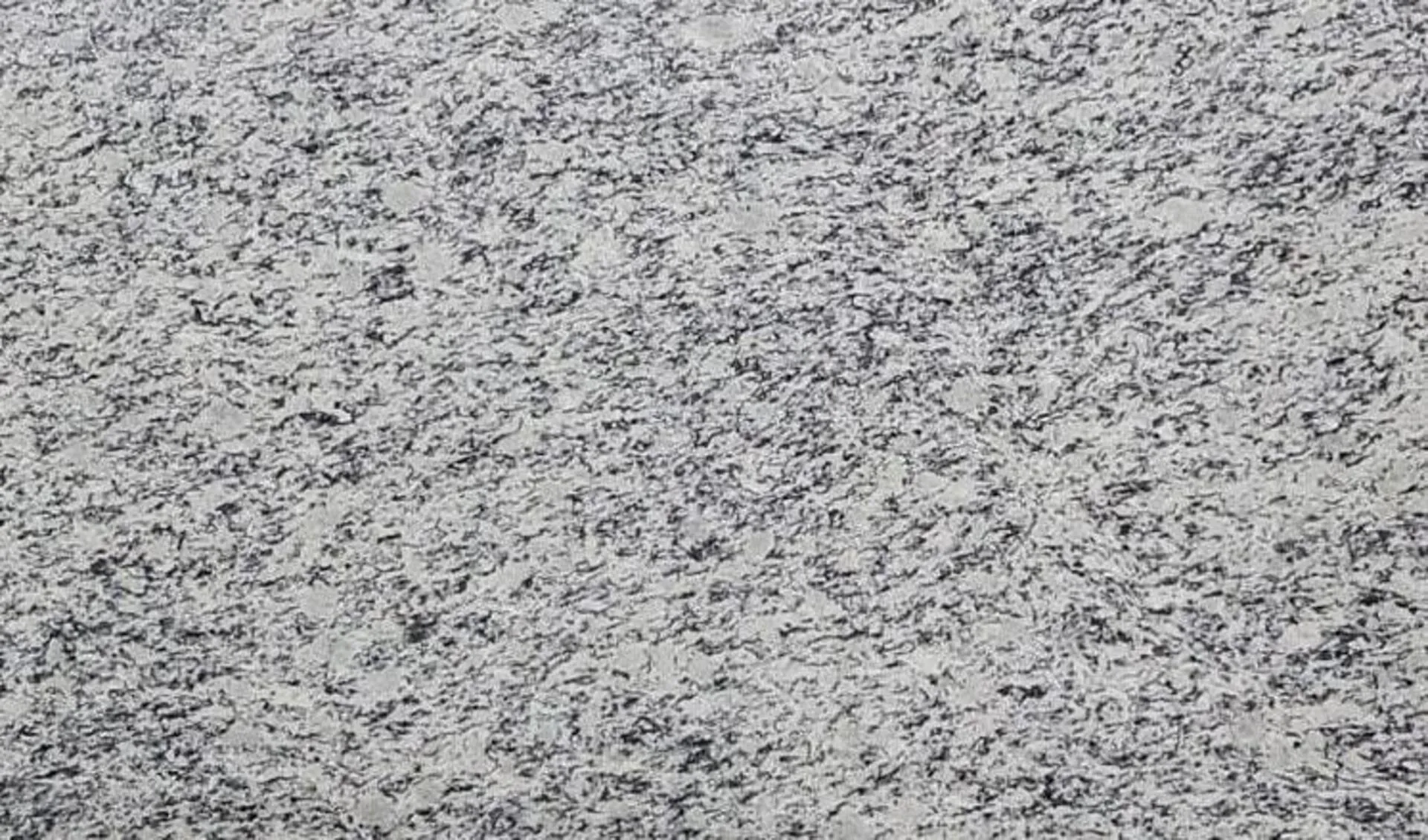 Closeup image of White Napoli Grey Granite countertop slab