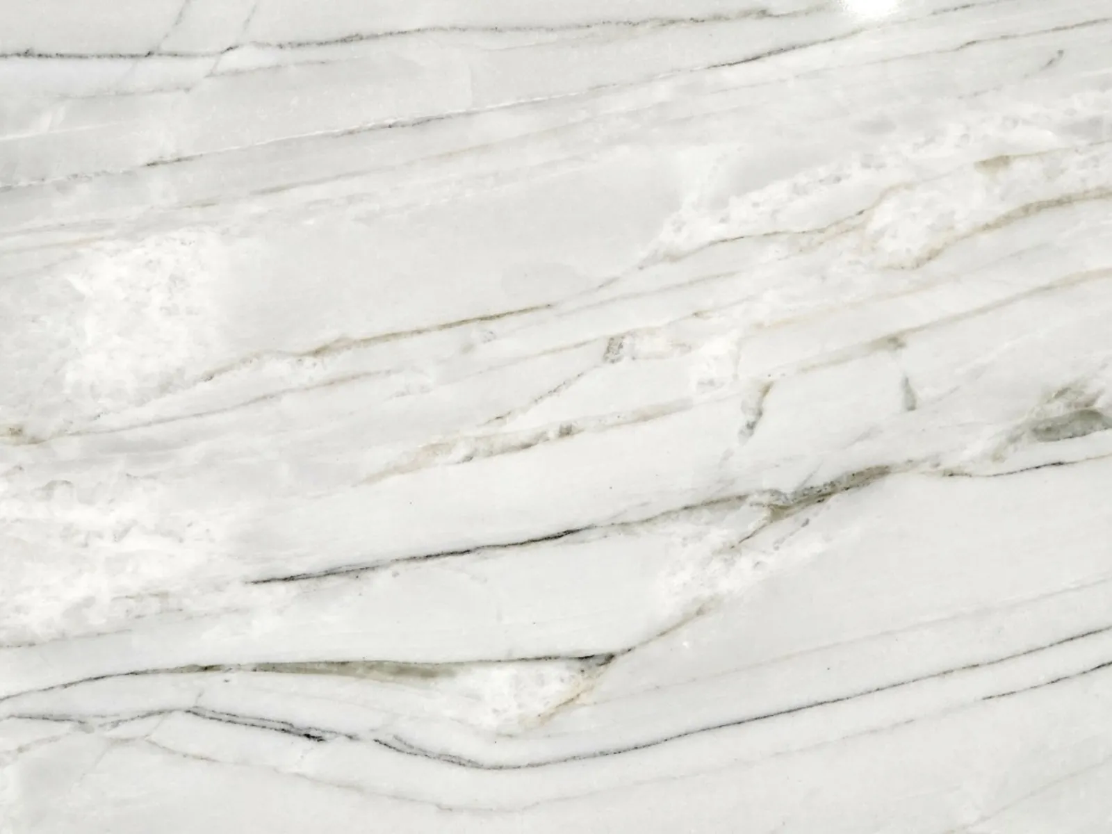 Closeup image of White Santorini White Quartzite countertop slab