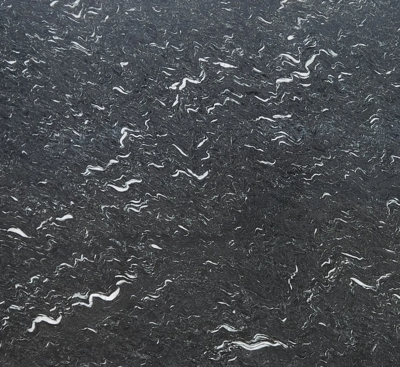 Closeup image of Laguna Black Finish Black Granite countertop slab
