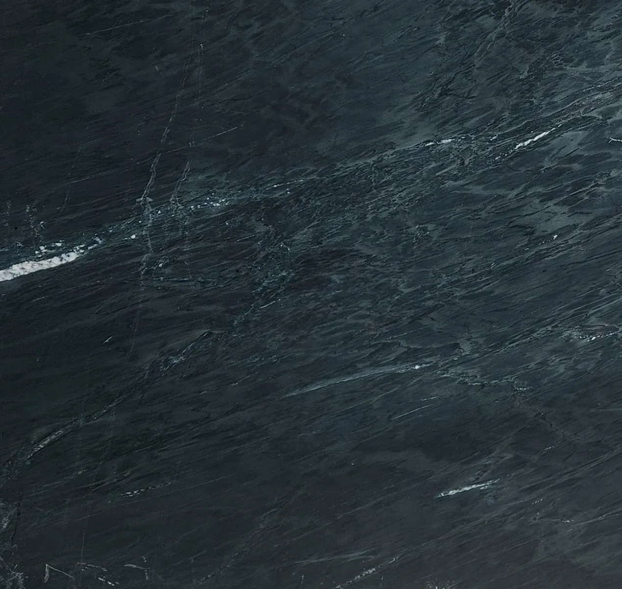 Closeup image of Marine Black Soapstone Black Soapstone countertop slab