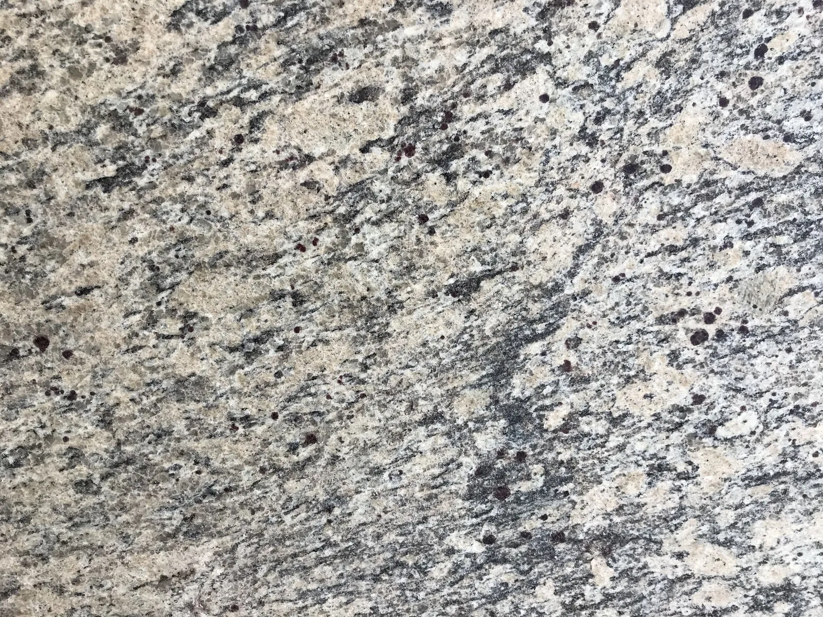 Closeup image of Santa Cecilia Light Beige Granite countertop slab