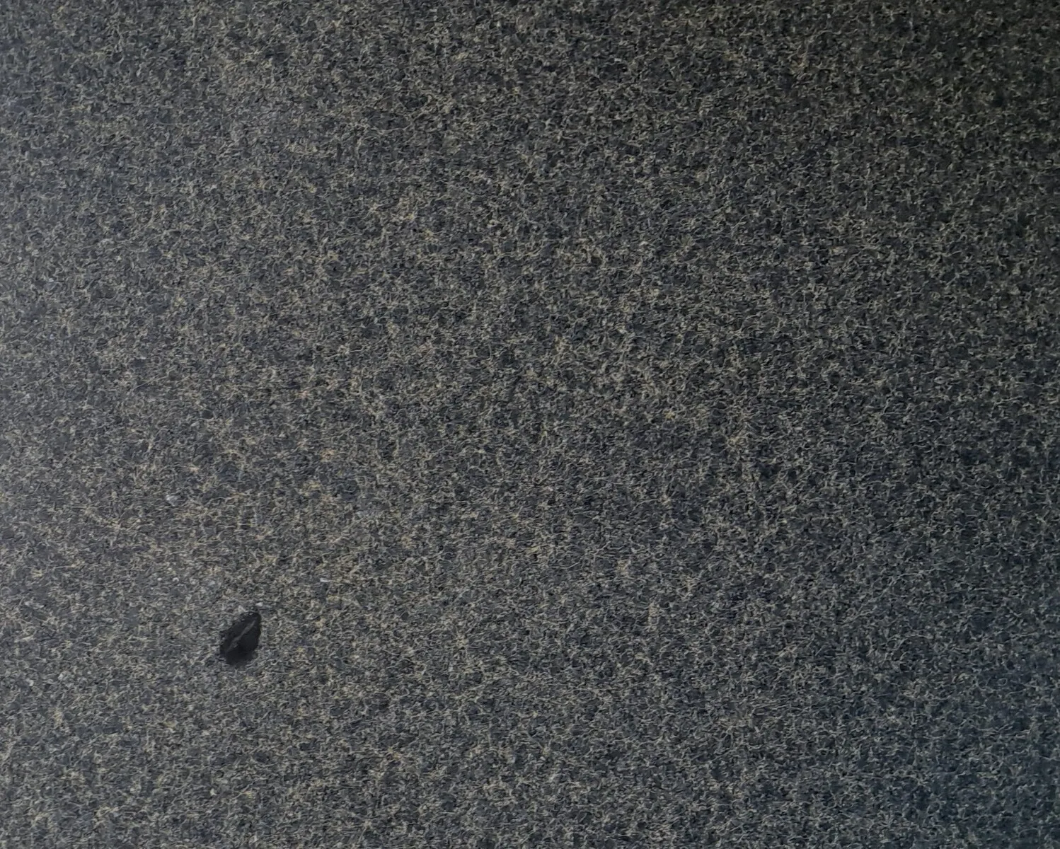 Closeup image of Ubatuba Finish Black Granite countertop slab