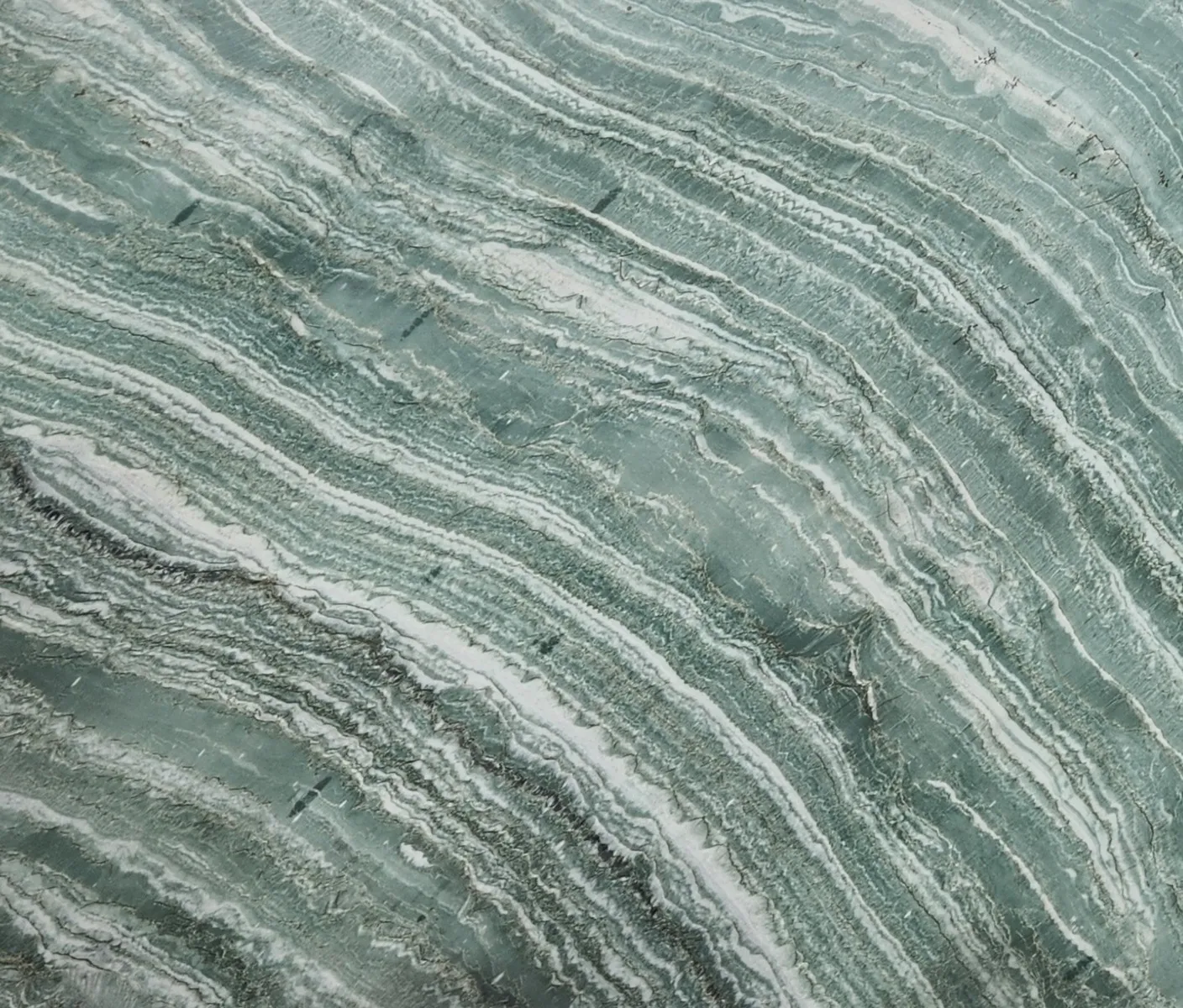 Closeup image of Vivid Green Green Quartzite countertop slab