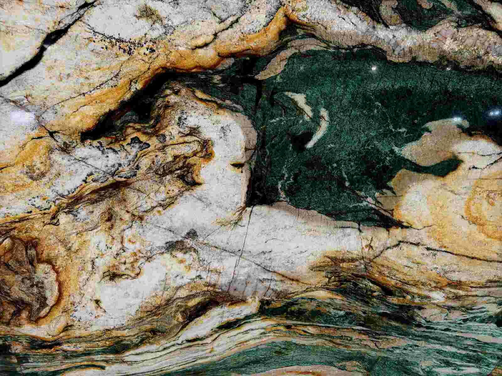 Closeup image of Acque Luise Green Quartzite countertop slab
