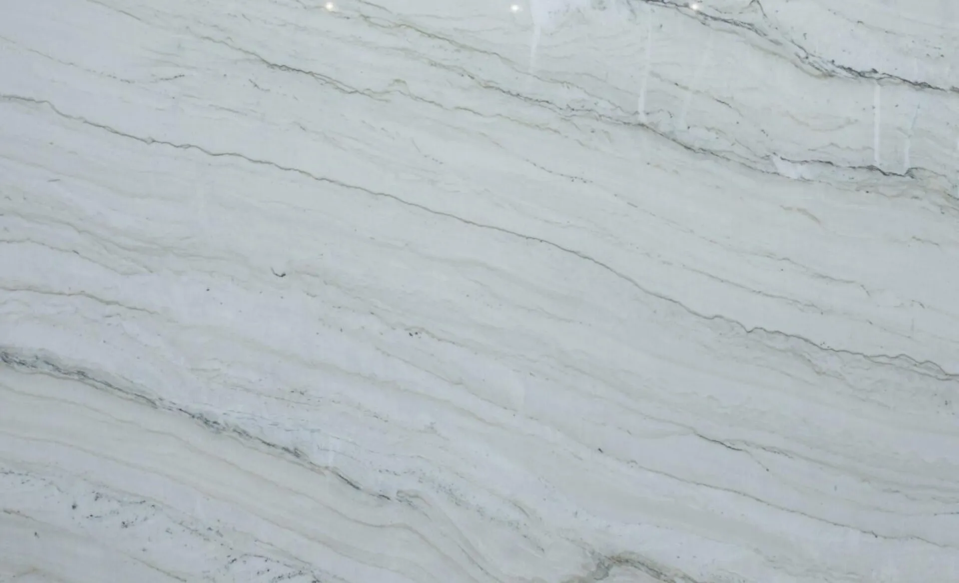 Closeup image of Bellagio Cream Quartzite countertop slab