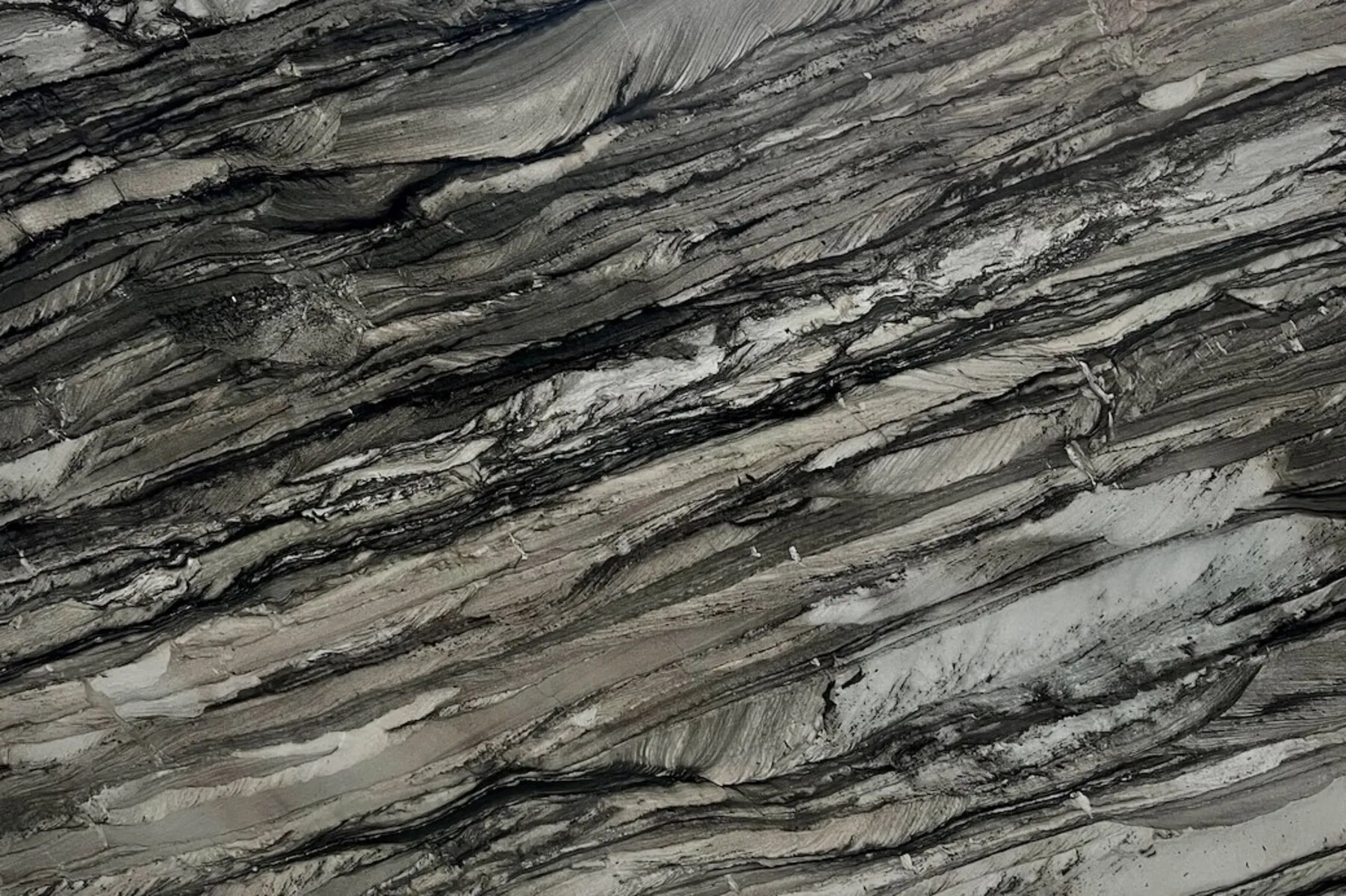 Closeup image of Black Swan Soft Grey Quartzite countertop slab