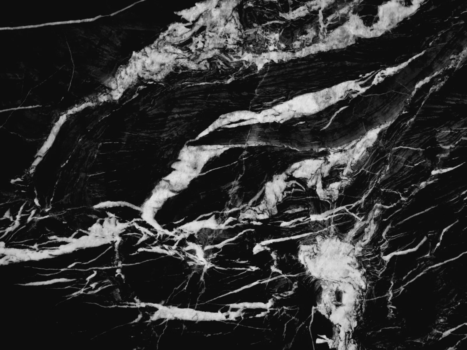Closeup image of Mandrak Black Quartzite countertop slab